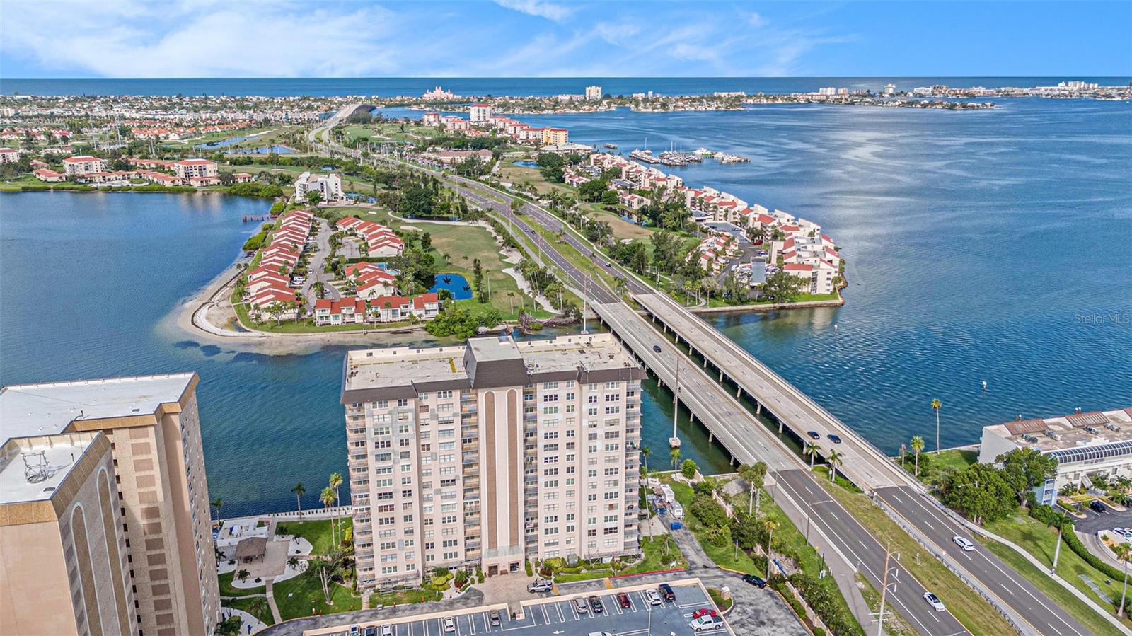 UNBEATABLE SUNSETS! This amazing 12th floor condo at Point Brittany will not leave you disappointed. It has many new updates, including automatic interior lightning with sensors in the entryway, kitchen, bathroom and office/desk area of the bedroom. New tile floors, new hurricane windows, new refrigerator, new over the range microwave, new ceiling fan, and updated bathroom. This community offers more than most do with amazing water views, both inside the condo and outside. Each condo comes with a private storage unit, there is free bike storage on the 12th floor, free, laundry facilities on the same floor, you also have access to all four heated pools, kayak/canoe storage and launch, barbecue pits, pavilion, fishing pier, Bicycle parking on ground level, as well as optional paid bicycle storage in the community, and best of all optional boat slips which are first come first serve. Come check out this beautiful condo with unbeatable sunsets today!