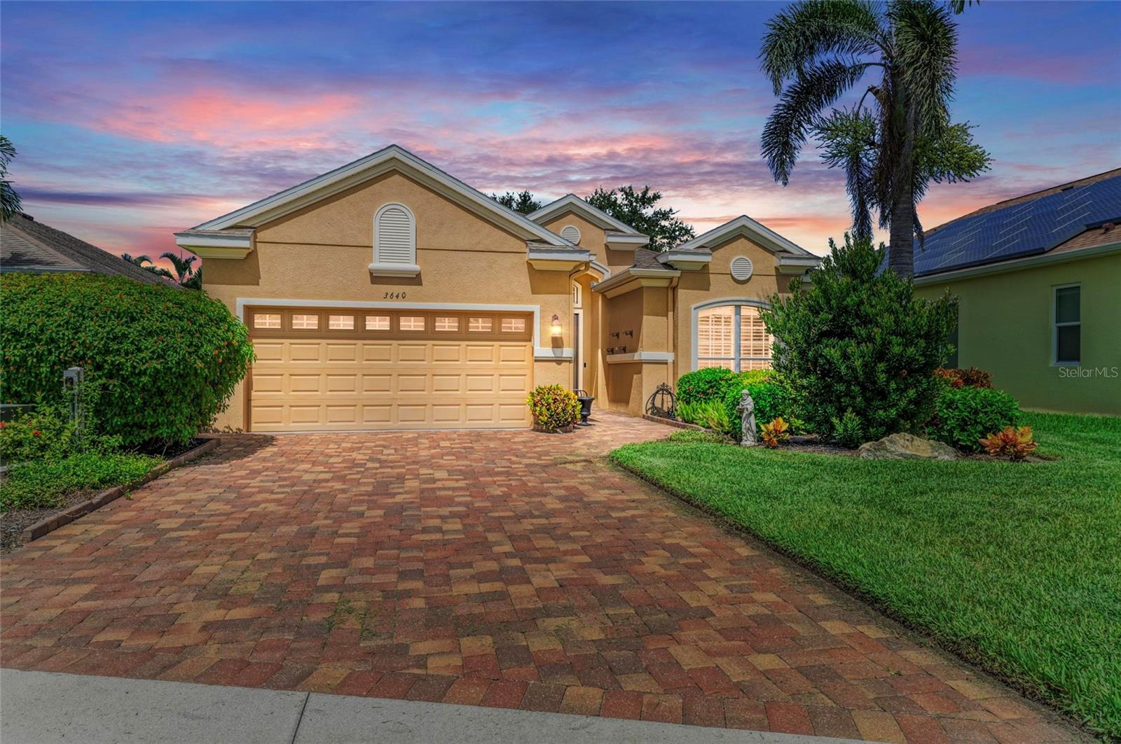 This is the one! This beautiful home is move-in ready with one of the most desirable floor plans in the friendly Palma Sola Trace community. The spacious home offers 2,180 sqft of living area with a split floor plan with two bedrooms, two baths and a den/study that could be converted into a third bedroom. This spotless home has many recent updates which include a brand new roof installed less than a year ago, new luxury vinyl flooring, crown molding throughout, high ceilings with recessed lighting, driveway pavers, extended screened-in paver lanai, window plantation shutters and accordion style shades, new water heater, brand new landscaping, custom built bedroom closets, security system and laundry room with built-in cabinets and utility sink. Enjoy cooking your your favorite meals in the open kitchen with granite counter-tops, stainless steel appliances including newer refrigerator, dishwasher and microwave, 42" wood cabinets, breakfast nook and breakfast bar. The large living area provides plenty of space for entertaining family and friends. The large primary suite has tray ceilings with an ensuite bathroom outfitted with separate dual vanities, luxurious garden tub, walk-in shower, make-up counter, linen closet, private toilet room and large custom built dual walk-in closets. The guest bedroom is on the other side of the home offering privacy with an adjacent bathroom with tub and linen closet. The den/office is perfect for your business activities or to turn into a third bedroom. Step out back to the extended paved screened-in lanai to grill your favorite meals, entertain guest and family or to enjoy beautiful sunsets. The two car garage offers an abundance of storage with two 4 x 8 overhead garage storage racks. Some furniture available to purchase separately. The association fee includes cable and high-speed internet, plus residents enjoy a maintenance-free lifestyle, lawn care is included providing plenty of time to enjoy the world-famous beaches less than 5 miles away or the community clubhouse with playground, fitness center and fantastic 81-foot heated lagoon-style swimming pool. Community activities include yoga, book clubs, lunch groups, dances and holiday parties. Blake Hospital, post office, shopping, restaurants and entertainment are within a few minutes away. Spend the day touring Anna Maria Island, go deep-sea fishing, jet-skiing in the Gulf of Mexico, kayaking and picnicking at Robinson's Preserve. Be sure to schedule your appointment to view this amazing home!