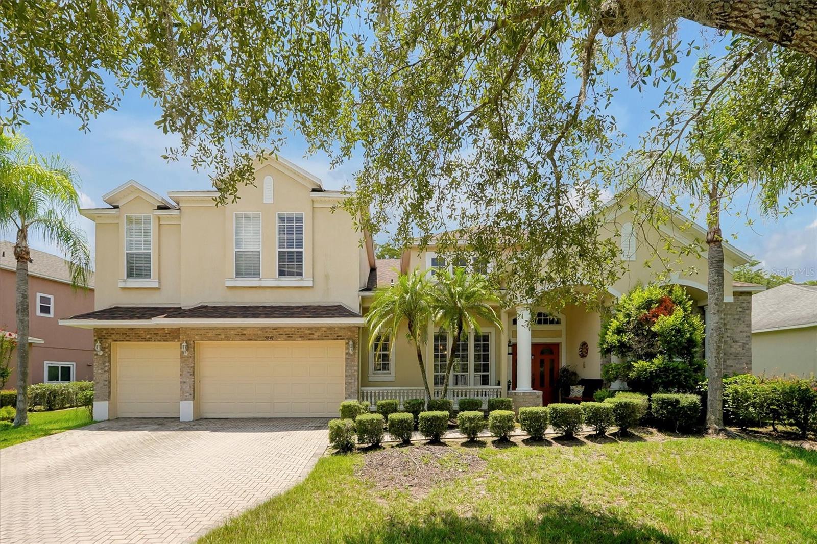 Presenting a rare opportunity to own one of Vista Lakes’ most distinguished residences—an expansive single-story luxury home featuring a three-car garage, an upstairs bonus room, and captivating conservation view. Located within the community’s most exclusive gated neighborhood, this home exemplifies architectural sophistication, exceptional craftsmanship, and an unrivaled location. If convenience and comfort are what you seek, look no further. Enjoy the luxury of walking to Vista Lakes’ Publix, a gas station, doctors’ offices, local restaurants, Urgent Care, pharmacy and more—all just steps away.
Designed with versatility in mind, this residence offers six bedrooms, including a multi-purpose sixth room perfect as an in-law suite, media lounge, game room, or private guest retreat. Maintained by its original owner, the home radiates both warmth and refinement. The grand extended foyer creates a striking first impression, drawing the eye toward panoramic views of the resort-style pool deck and serene conservation beyond. The inviting kitchen is beautifully appointed for both intimate family meals and grand-scale entertaining, featuring a central island, modern breakfast bar, and generous dining area—all seamlessly connected to the home’s open living spaces.
A thoughtfully designed three-way split floor plan ensures privacy for the primary suite, which is enhanced by a charming window retreat overlooking the tranquil outdoors, along with a private connection to the fourth bedroom, currently used as a home office but offering flexibility as a nursery, study, or fitness space. The spa-inspired primary bath impresses with dual vanities and refined finishes. The impressive family room, nearly 30 feet in length, is anchored by a soft-stone frame gas fireplace, creating an elegant and comfortable focal point. Additional guest suites provide ample space for family and visitors.
Sliding glass doors open from all principal living areas onto a spectacular pool terrace equipped with Bose surround sound to set the ambiance. Surrounded by lush, manicured landscaping and fully enclosed for privacy, the outdoor space offers multiple seating and dining areas ideal for year-round enjoyment. Adding to the home’s functionality is a convenient shed for outdoor gardening and machinery storage. Recent upgrades include a new roof and water heater (2024).
Residents of Vista Lakes enjoy a wealth of amenities, including a community fitness center, tennis and pickleball courts, basketball, dog park, an Olympic-sized heated pool with waterslide, a young-resident splash area, and a vibrant calendar of community events—all within minutes of major highways-417, 408, 528, Orlando International Airport, and a short drive to the Atlantic coastline. Homes of this caliber—combining luxury, privacy, and a premier address—rarely come to market. This exceptional property presents a truly extraordinary opportunity to experience the finest in Florida living.
Schedule your private showing today