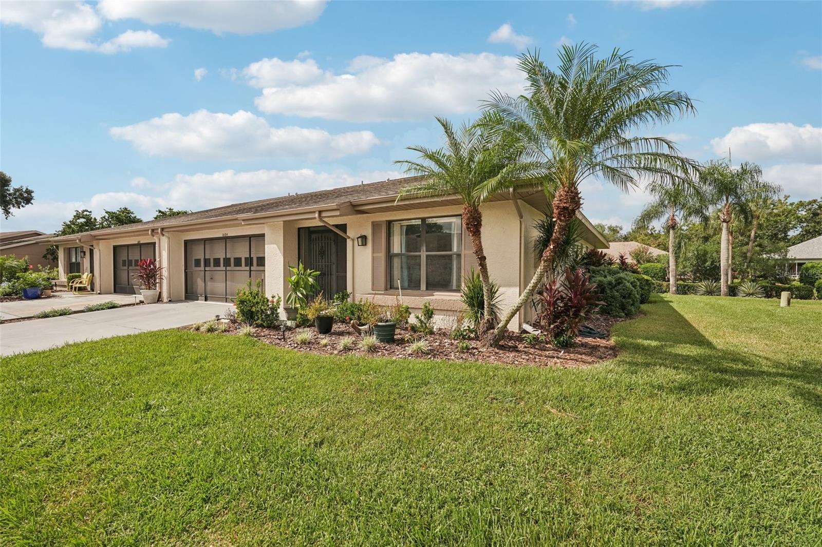 Short Sale. Enjoy carefree Florida living in this beautifully updated 2-bedroom, 2-bath condo with a 2-car garage and dedicated golf cart parking, located in the desirable Kings Point community of Sun City Center. Step into a spacious living area with laminate flooring and abundant natural light. The dining area features floor-to-ceiling windows with views into the kitchen and breakfast bar, making it ideal for everyday living and entertaining.
The kitchen offers stone countertops, plenty of cabinet space, and access to the bright Florida room—perfect for relaxing or hosting guests. The primary suite features laminate flooring, large windows, and a stunning 2025-renovated en suite with a walk-in glass shower, elegant tile, stone countertops, and double vessel sinks. The second bedroom is generously sized and located near the updated guest bath.
This home features tile flooring throughout, with the exception of the living room and primary bedroom, which have laminate. Enjoy the convenience of washer and dryer hookups in the garage, along with a water softener and 2025-installed electrical setup for a generator, ideal for peace of mind during hurricane season.
Major updates include: 2022 – New water heater, new AC, new ductwork, new electric panel, and all new fans and lights. 2025 – New dishwasher, new garbage disposal, and remodeled primary bath.
You’ll love the gated community of Kings Point, which has amazing facilities, pools, clubs and events just waiting for you to enjoy. Located between Sarasota and Tampa, this home is perfectly positioned for a convenient ride to airports, great shopping, dining, and professional entertainment. With easy access to award-winning, sandy beaches, you’ll experience the best of all worlds—without the stress of big city life. Leave the hustle behind and embrace a new chapter in Sun City Center, Florida, the state's top-ranked and most affordable 55+ retirement community.
Relax in the Florida room or unwind on the covered back patio—either way, you’ll love the lifestyle and amenities that Kings Point has to offer!