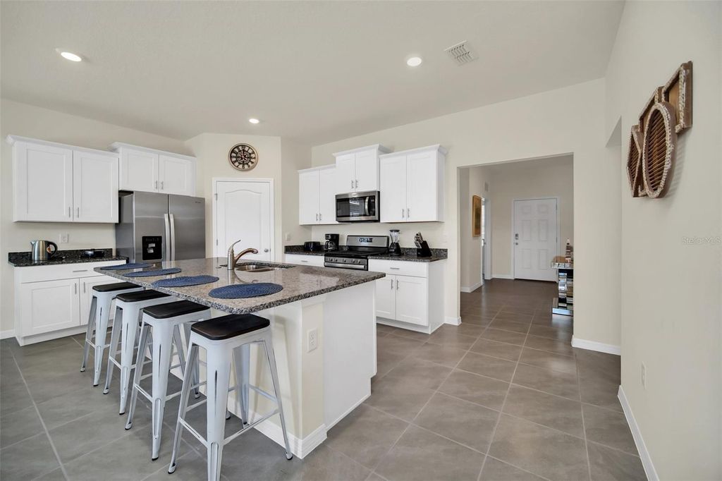 Photo of 7876 Oak Reflection Loop, Davenport, FL 33837 (MLS # S5154499)