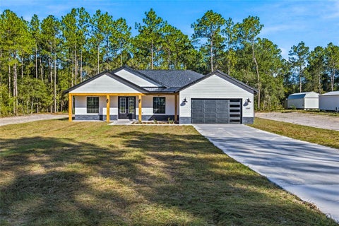 Photo of 12567 SW 64th St Road, Ocala, FL 34481 (MLS # OM734130)