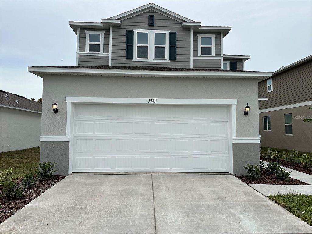 Photo of 37411 Roanoke River Way, Zephyrhills, FL 33540 (MLS # J994894)