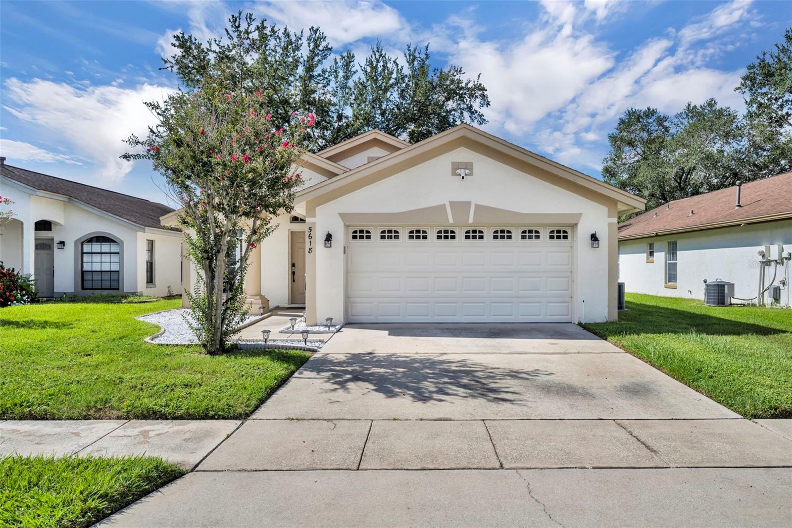 Welcome home to desirable Parkview Terrace! This this charming 3 bed, 2 bath, one-story home has an open and split floor plan. New LVP flooring (2025) in all living areas & bedrooms. The family room has gorgeous feature wall with attached console. The generous kitchen features a new sink & faucet (2024), stove (2019), new refrigerator (2024), new dishwasher (2024), as well as an eat-in breakfast nook, closet pantry and a pass-through bar into the family room. The spacious primary suite features sliding glass doors to the screened patio, a walk-in closet, ceiling fan with a primary en suite that has dual sinks and a walk-in shower. The second and third bedrooms have ceiling fans and share the hall/guest bath, which has a tub/shower combo and large vanity. Enjoy the outdoors on your screened back porch. Among the home improvements/updates: new AC Compressor(2022), new washer and dryer (2020), new water heater (2023), new ceiling fans (2024), replumb and roof (2013). The laundry closet is in the large 2 car garage. Neighborhood amenities include lawn maintenance (mowing), clubhouse, 2 tennis courts, 3community pools and spa/hot tub for approximately $105.00 per month. Restrictions to note: the community does not allow fences and the home cannot be leased until the owner has owned and occupied it for one year. This wonderful location is just minutes to shopping, restaurants, theme parks and Orlando Health Dr. P. Phillips Hospital. Easy Access to major roads, airports and downtown. Call for your showing today!