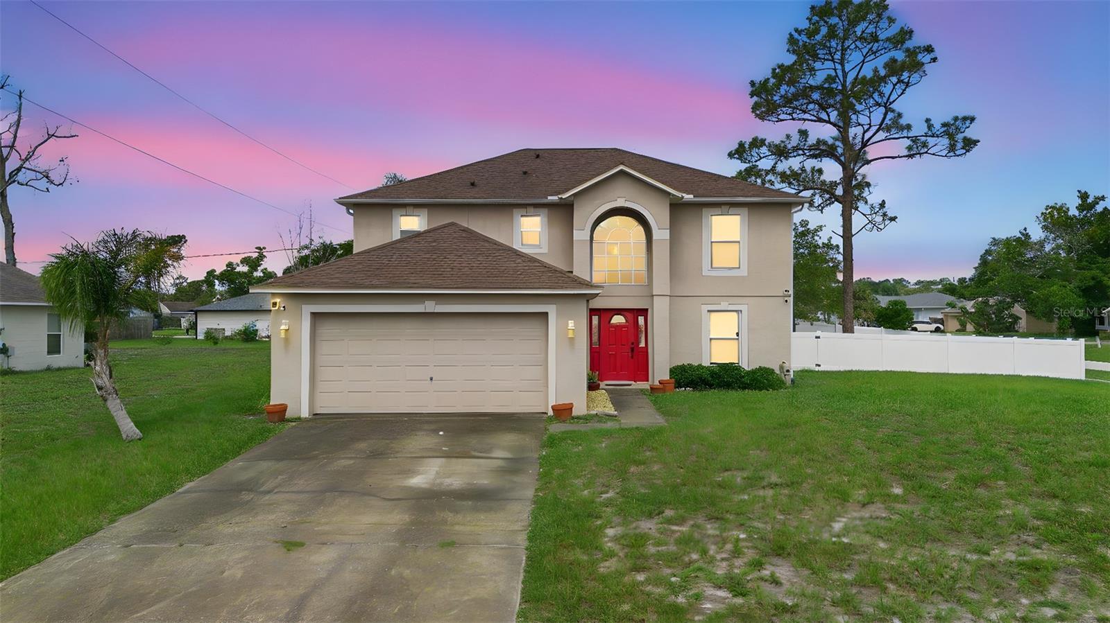 Welcome to this stunning 4-bedroom, 2.5-bath, two-story home which offers almost 2,300 square feet of spacious living with a fresh new look and feel. Recently painted throughout and featuring brand new carpet upstairs, this home is move-in ready! You'll fall in love with the fully remodeled kitchen, complete with modern cabinetry, stylish countertops, and updated appliances — perfect for hosting or everyday living. The formal dining room, finished with luxury tile flooring, flows seamlessly into the large family and living rooms, providing plenty of space to relax or entertain. Step outside to your expansive fenced-in backyard, privately enclosed with durable vinyl fencing — ideal for gardening, pets, or weekend BBQs. Located on a desirable corner lot, this home also includes an attached 2-car garage and sits on over a quarter acre. Zoned for great local schools and just minutes from shopping, restaurants, and parks, this home checks all the boxes. No HOA and no flood insurance required (Zone X). Schedule your private tour today and make this gem yours before it’s gone!