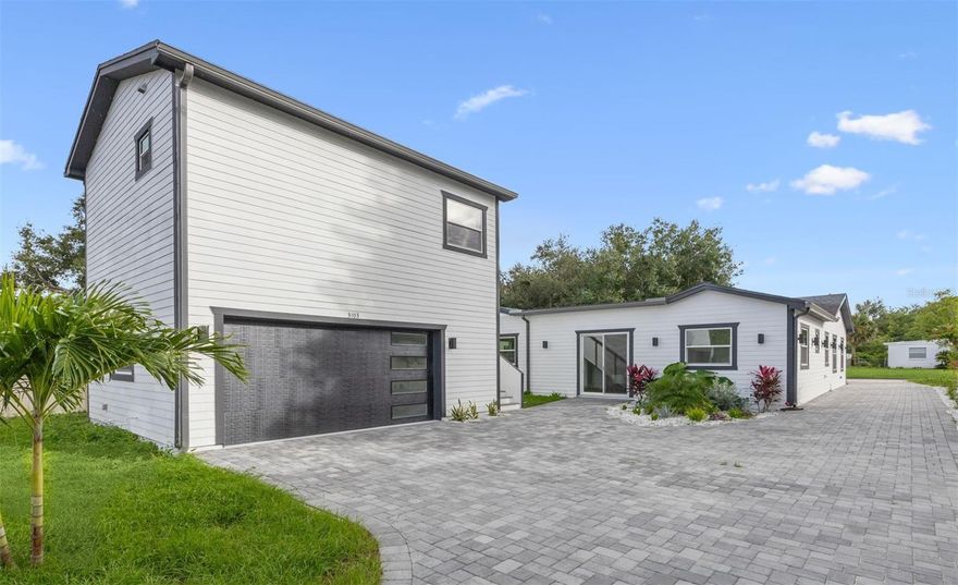 Brand new construction meets modern elegance at 3101 Pickfair Street in Orlando, Florida a home that perfectly blends design, functionality, and investment potential. This stunning 5-bedroom, 4-bath residence built in 2025 offers approximately 2,483 square feet of beautifully designed living space, including a detached guest suite that can serve as a **multigenerational unit or a rental** to help offset your mortgage. Inside, you’ll find wood floors throughout, soaring ceilings, a gourmet kitchen with a large island and quartz countertops, and huge windows that fill every room with natural light. The open-concept layout creates a seamless flow between living, dining, and entertaining spaces, making it both sophisticated and comfortable. The exterior features a long driveway with elegant pavers, modern curb appeal, and the added benefit of **no homeowners association**, giving you freedom and flexibility.

Ideally located just 2.8 miles or about a 6-minute drive from **Lake Eola Park** and downtown Orlando, this property offers quick access to **Publix, Target, and Starbucks**, all within 1–2 miles. It’s also perfectly positioned for those who travel often or appreciate convenience, being approximately **20 minutes from Orlando International Airport** and only **10 minutes from the Orlando Executive Airport**. This central location places you near top dining, shopping, and entertainment venues, making it an excellent choice for professionals, families, or investors seeking both lifestyle and long-term value.

The detached back unit, complete with its own entrance and kitchen, provides an outstanding opportunity for extra income, guest accommodations, or multigenerational living in one of Orlando’s most desirable rental areas. With brand new construction ensuring low maintenance and peace of mind, plus a fenced yard and beautiful architectural details, **3101 Pickfair Street** is more than a home, it’s a smart investment and a lifestyle upgrade in one. Schedule your private showing today and experience a property where elegance, practicality, and profitability come together in the heart of Orlando.