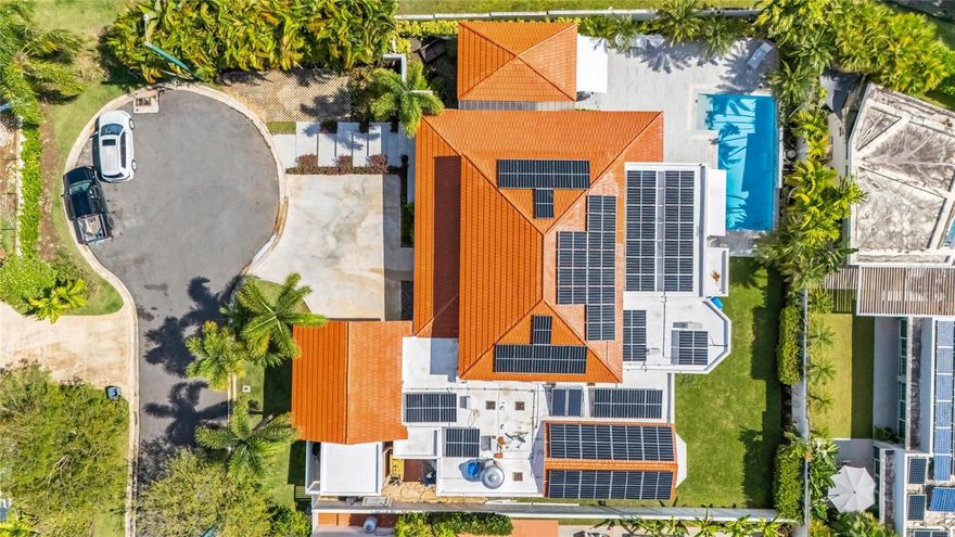 Exquisite Corner Residence on a Cul-de-Sac | Sabanera Dorado

Nestled on a generous 1,100 sq. meter corner lot within the sought-after Sabanera Dorado community, this elegant home offers the perfect blend of luxury, comfort, and privacy. With 5,793 sq. ft. of total living space—4,028 sq. ft. interior and 1,765 sq. ft. exterior—this beautifully appointed residence features four spacious bedrooms, four full bathrooms, and a half bath, designed for refined family living and effortless entertaining.

The home boasts a fully remodeled kitchen equipped with premium Electrolux and GE Monogram appliances, a walk-in pantry, and a dedicated laundry room. Multiple indoor and outdoor living areas include a formal family area, covered and open terraces, a private balcony, and an impressive outdoor BBQ space with uninterrupted views, ideal for gatherings.

Enjoy resort-style living with a heated swimming pool, lush landscaping, and top-tier amenities, including a full-power generator, a water cistern, a water softener, solar panels with four Tesla batteries for energy efficiency, two Tesla chargers for electric cars and spacious double garage. Located in a tranquil cul-de-sac, this residence combines sustainable living with modern luxury—an exceptional opportunity within one of Dorado's most desirable gated communities.