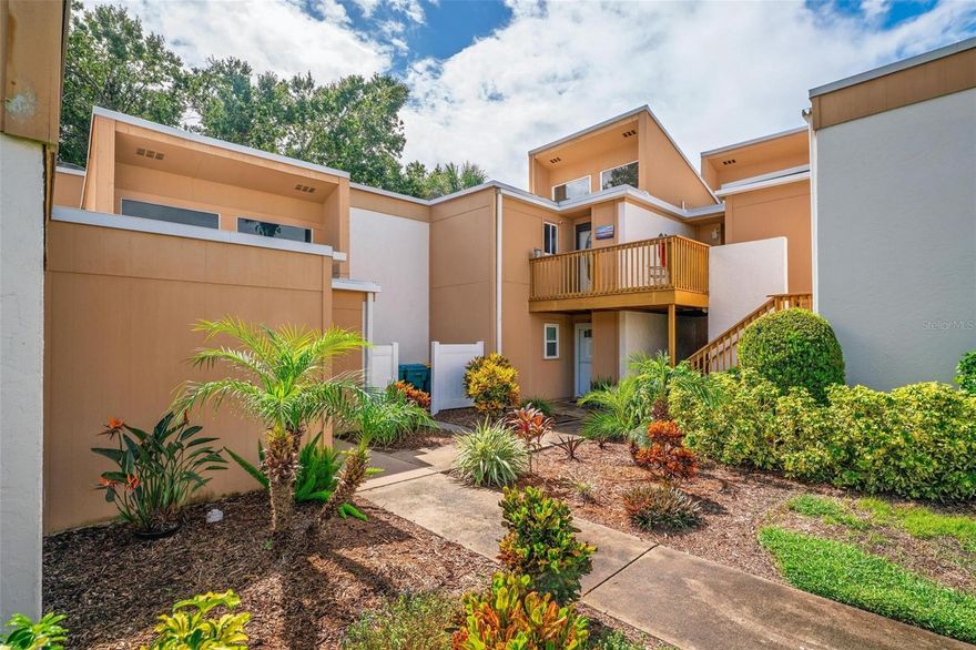 Stylishly Updated 2BR/2BA Condo with Pool View – Just 1 Mile from Downtown Mount Dora! Enjoy modern living in this beautifully refreshed condo overlooking the community pool and located just minutes from all the charm of downtown Mount Dora. Step inside to a bright, open living space with soaring ceilings, fresh paint, new flooring, and a refinished fireplace that creates a warm, inviting atmosphere. The kitchen features stainless steel appliances, a convenient breakfast bar, and newer dishwasher and stove. Major improvements in 2022 include new sliders, windows, and doors—offering added efficiency and peace of mind. The spacious primary suite includes a large walk-in closet, dual vanities, and a private bath with a step-in shower. The guest bedroom is equally comfortable with easy access to the second full bathroom featuring a tub/shower combo. A versatile bonus space just off the living room makes an ideal home office, dining nook, or cozy reading spot. The unit also comes with its own washer and dryer, a valuable convenience. Sip your morning coffee or relax at sunset on the private balcony overlooking the sparkling pool. Located approximately one mile from downtown Mount Dora, you’re perfectly positioned to enjoy year-round festivals, boutiques, waterfront dining, and the scenic Chain of Lakes. Outdoor enthusiasts will love being close to Lake Dora for boating and fishing, while commuters appreciate quick access to US 441, making outings to Orlando, Disney, and both coasts easy. Move-in ready and ideally located, this condo offers a winning combination of updates, comfort, and lifestyle. Schedule your showing today—this one won’t last!