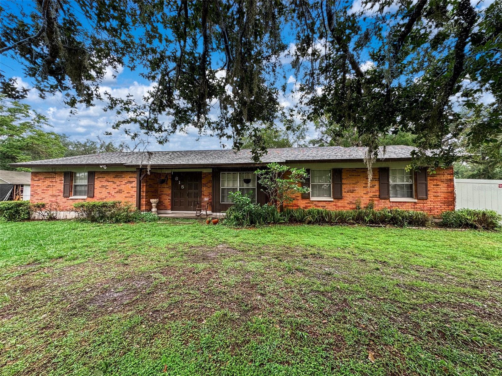 Welcome to this charming 4-bedroom, 2-bath ranch-style home in the heart of Wauchula! Featuring a spacious and inviting floor plan, this home offers a large living room, a generous kitchen with a breakfast bar, and a formal dining area perfect for gatherings. Enjoy the convenience of a dedicated laundry room and the comfort of newer flooring in the main living areas. Nestled on over half an acre, the property offers plenty of outdoor space with room to expand, garden, or simply enjoy the peaceful setting. Move-in ready with loads of potential to make it your own!