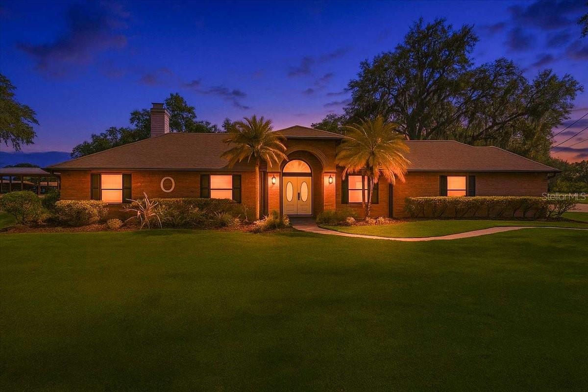 Welcome to your serene retreat on Leila Estelle Drive—where timeless elegance meets country charm in a residence designed to bring generations together. Nestled in the heart of Plant City, this exceptional estate offers a harmonious blend of refined living and everyday comfort.
The main residence has been thoughtfully updated and showcases sophisticated formal living and dining spaces, a dedicated home office or den, a warm and inviting family room anchored by a fireplace, and a luxurious owner’s suite featuring its own fireplace and private access to the screened pool. Recent enhancements include premium flooring, quartz countertops, designer lighting, modern kitchen appliances, upgraded bathrooms, a newer HVAC system, and an improved water heater—every detail carefully considered.
The separate guest house offers incredible versatility with a generous 40x30 great room, a fully equipped kitchen with new flooring, two spacious bedrooms, an updated bath, and climate-controlled interiors—ideal for hosting, multigenerational living, or creative pursuits.
Step outside to enjoy Florida living at its finest with a screened and covered lanai, a partial outdoor kitchen, and expansive outdoor space. The property also includes a well, irrigation system, newer septic systems, a large custom chicken coop, and plenty of room to roam—all set against a backdrop of rural peace just minutes from town.
With easy access to I-4, you're perfectly positioned near local favorites like Keel Farms and Dinosaur World, and only a short drive from world-class attractions including Disney World, the Seminole Hard Rock Hotel & Casino, the Florida State Fairgrounds, and MacDill Air Force Base.
This four-bedroom, three-bathroom home with an attached two-car garage—featuring a new garage door—offers the rare opportunity to enjoy spacious, stylish living with room to grow. Come experience the quiet charm and refined beauty of this remarkable property.