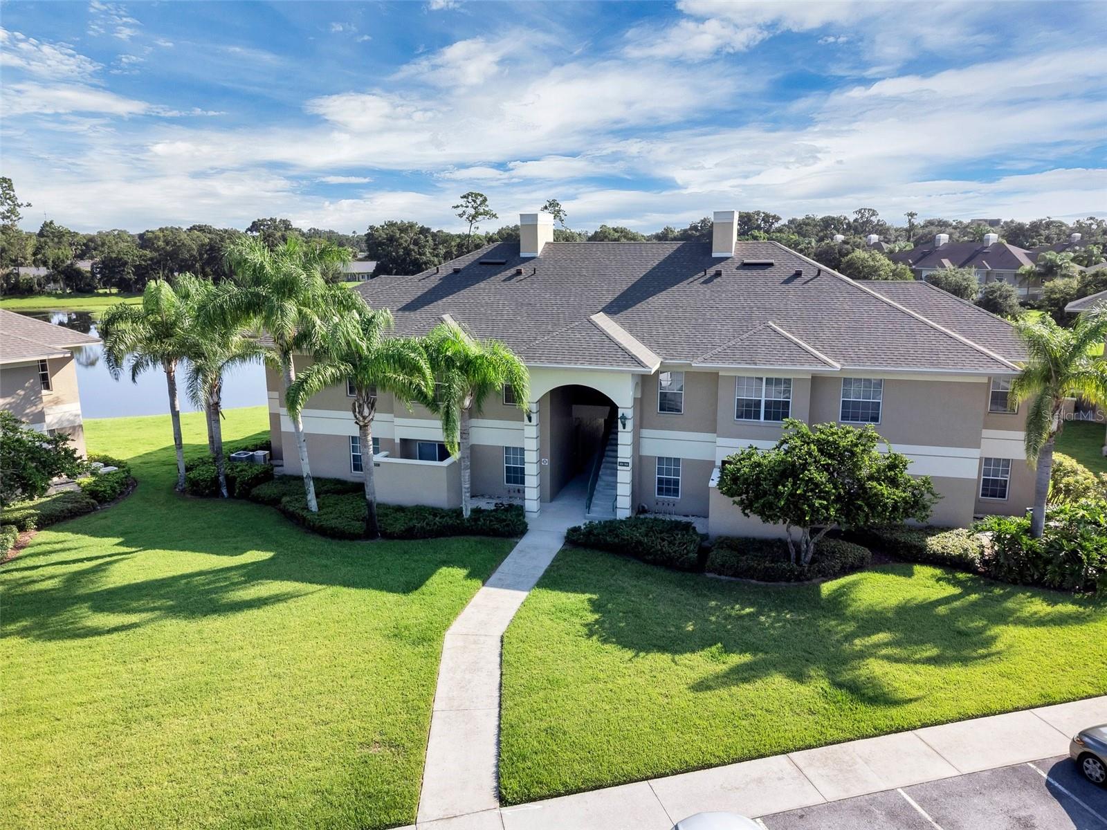 This beautiful second-floor Eagle Pond condo in the 24/7 guard-gated Cypresswood Golf & Country Club offers peaceful pond views you’ll love, visible from both bedrooms and the living room. With tall 10-foot ceilings and warm wood cabinets, the open living and dining area flows right into the breakfast bar kitchen, perfect for relaxing or hosting friends. Both bedrooms have roomy walk-in closets, plus there’s extra outside storage. The primary bedroom includes its own private bath for added convenience and privacy.
The low HOA takes care of exterior maintenance, landscaping, pest control, trash, and gives you access to the pool and tennis courts. You’ll also enjoy great community perks like an 18-hole Ron Garl golf course, a junior Olympic pool, tennis courts, clubhouse, and restaurant. All just minutes from Highway 27, I-4, Legoland, shopping, and dining.
Come see it for yourself and discover the relaxed, friendly lifestyle Cypresswood offers!