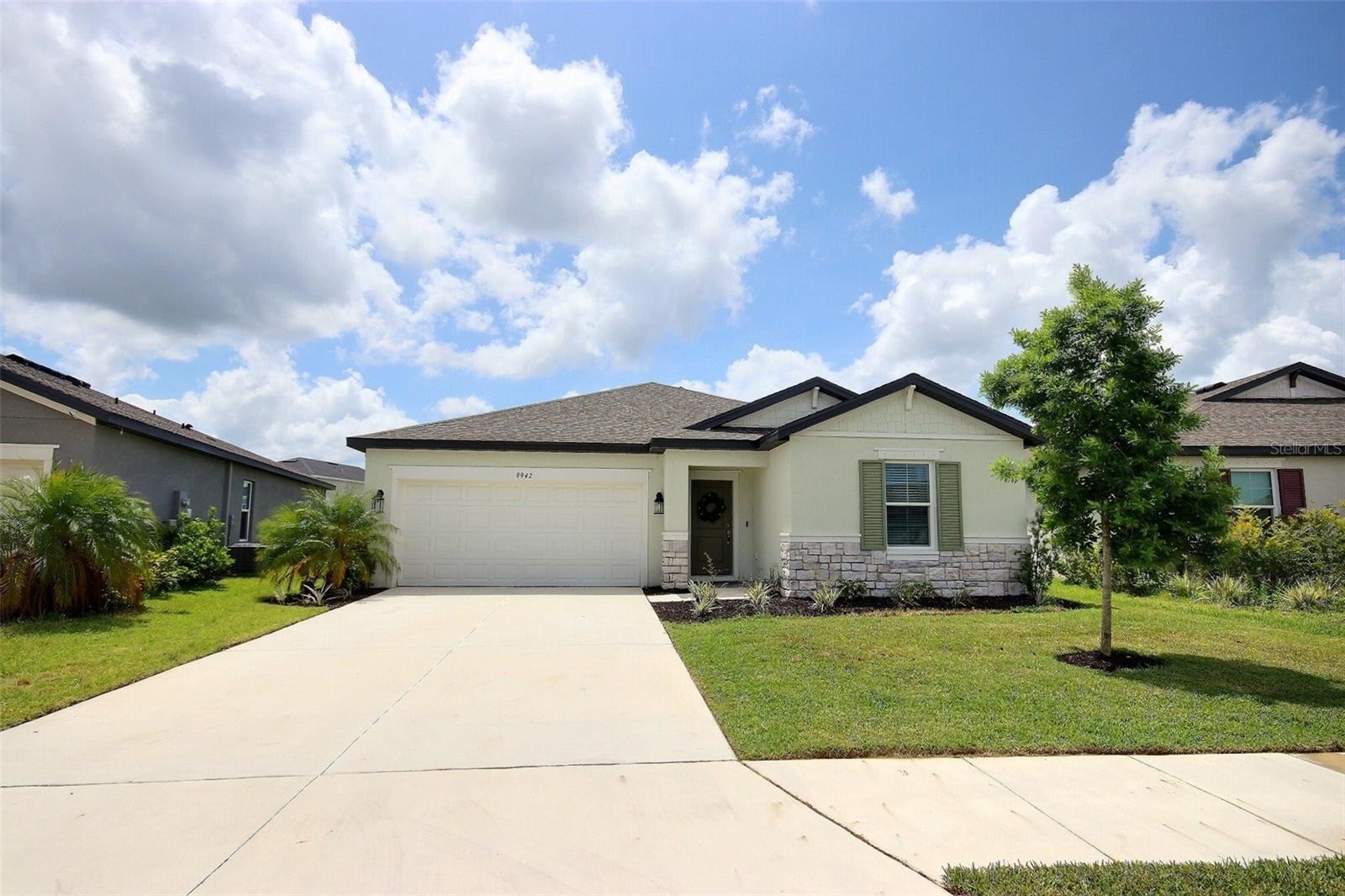 Welcome to this beautifully maintained 2023-built Bristol model home by M/I Homes, offering modern comfort and style in a sought-after gated community of Summerwoods. This 3-bedroom, 2-bathroom residence features an open floor plan with a spacious great room that seamlessly flows into a large kitchen, complete with a generous island, sleek quartz countertops, and stainless steel appliances. The sliding glass doors lead to a covered lanai and an oversized, fenced backyard—perfect for relaxing or entertaining. The owner’s suite is a private retreat, highlighted by a tray ceiling, a walk-in closet, and an ensuite bathroom with a walk-in shower. Additional highlights include a 2-car garage and included in the sale are the washer and dryer. Located in a USDA-approved area, this home qualifies for 100% financing for eligible buyers—an excellent opportunity for affordable homeownership. Residents enjoy resort-style amenities including a sparkling pool, splash pad, playground, and nature trail, all for a low HOA fee of just $456 per year. This is truly an exceptional area to live in. Within 30–40 minutes, you can have your toes in the powdery white sand of some of the world’s best beaches or reach vibrant cities such as St. Petersburg, Tampa, and Sarasota. With such convenient access to natural beauty and urban excitement, this location offers the best of both worlds. The Moccasin Wallow and I-75 interchange is Manatee County’s newest major growth center, with millions of square feet of retail space approved, a brand-new BayCare hospital, and new hotels, restaurants, and shopping on the horizon. Just over 2 miles away, you’ll find a brand-new shopping plaza anchored by a Publix grocery store. This move-in-ready home is perfect for the next family to enjoy the beautiful Florida lifestyle. Don’t miss out on the opportunity—schedule your private showing today and make this dream home yours!