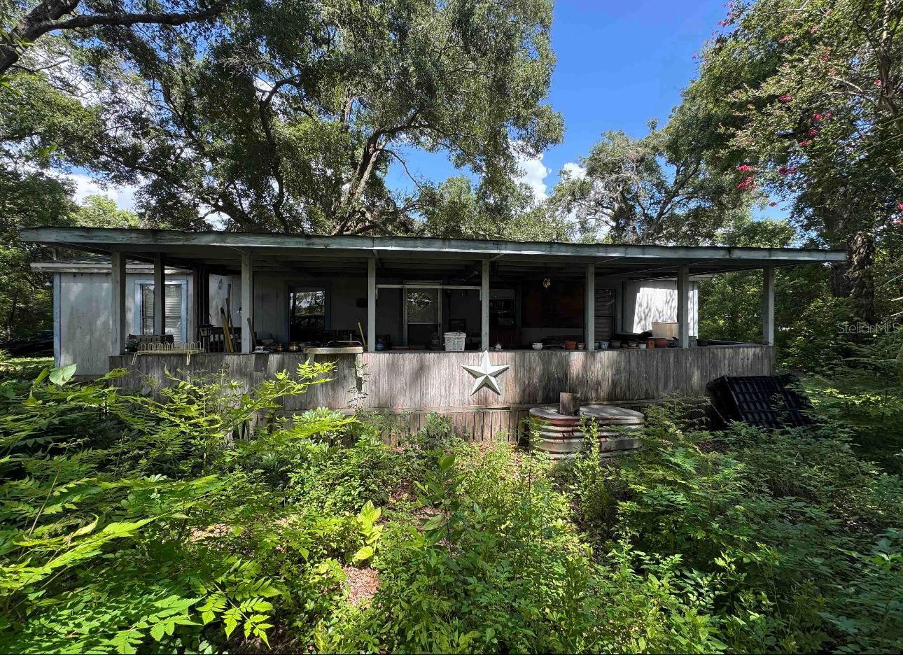 This affordable property is conveniently located in an area of Apopka where it feels like real country, yet within a few minutes, real Apopka City Life can be experienced. Seeing inside is to be a true believer...spacious and inviting formal areas - Three bedrooms, two bathrooms, Inside Utility, beautiful kitchen, dining area, living room and separate family room. Pretty soon you will probably forget that you are actually in a Manufactured Home! Investors or price conscious owner occupier buyers, here is a great opportunity. Take a look for yourselves! You will be pleased with the easy access to major roadways, shopping areas, worship centers, area theme parks, golf courses and more!