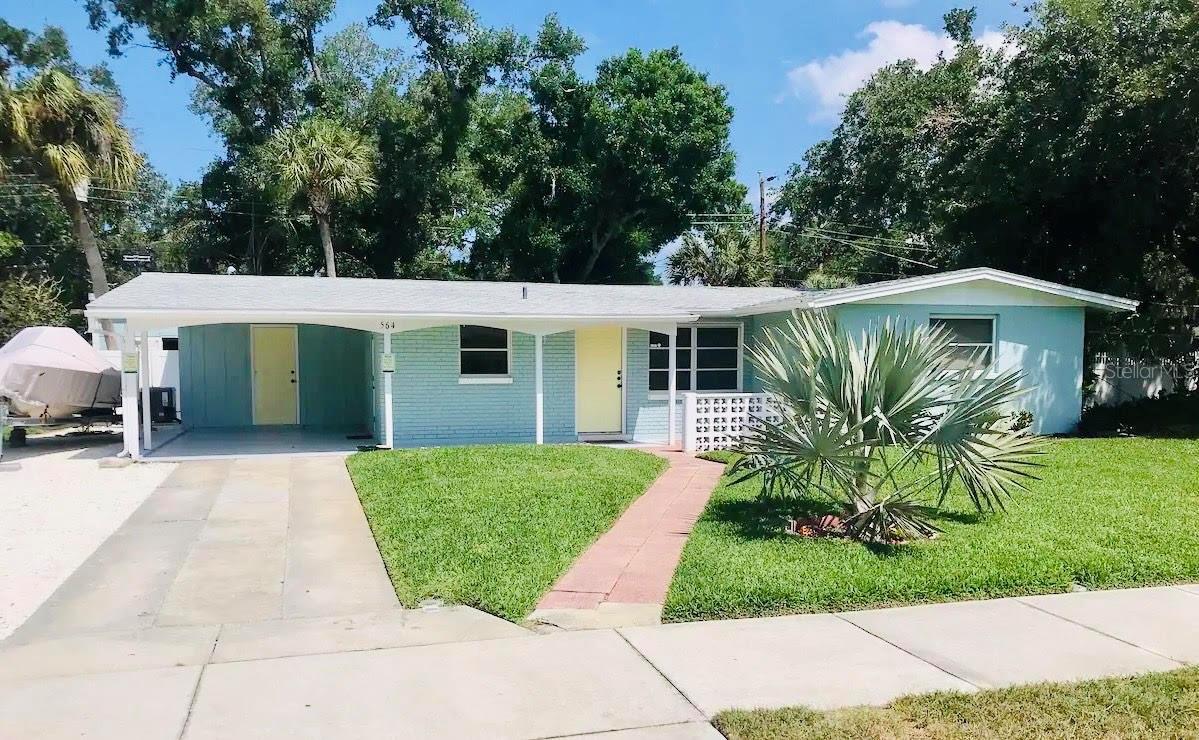 Looking for a "Primary Home" or a "Seasonal-Investment" Property here in Paradise? This home is located in the heart of South Venice, FL! NO FLOOD ZONE, NO HOA and NO CDD! Just minutes to the BEACH, shopping, and restaurants on and off the island of Venice! This well-maintained 2 bedroom, 2 bath home with a single attached carport AND extra parking space for your RV or BOAT is a MUST SEE!. Updated kitchen with plenty of counter space, newer appliances, and wood cabinetry. ROOF 2022, AC 2023, Attic Insulation 2023, Vinyl Fence 2023, New Lighting and Fans 2024, Well Pump 2024, Irrigation 2022, Terrazo Flooring throughout, updated bathrooms, Interior/Exterior Paint, Step outside to your private backyard that is fully fenced, beautifully landscaped, shade trees and patio area. Sit back, relax, and enjoy the peace & tranquility while enjoying the Florida sunshine(back exposure NW and front exposure SE) Extra storage is provided in the 1 shed. Live the Florida lifestyle & make this your home! South Venice has a boat launch area and a private beach ferry to shuttle you to a private beach for a low annual fee, not required. OWN A PIECE OF PARADISE IN VENICE, FL!