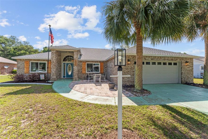Come and take a look at this beautiful home centrally located in Kings Court in SW Ocala on a cul-de-sac.  The home offers over 2000 square feet of living space and  features a brand new roof (Nov. 2025), new windows (2022),  HVAC (2023), and water heater (2023). With all of these essentials already taken care of you can move right in and make this your dream home. The  large living room with vaulted ceilings provides an open and airy feeling where you can look out on your almost 1/2 acre of property!  A large eat in kitchen and a dining area attached to the living room give you two options when it is time to gather around for dinner. Split bedrooms allow for privacy; the primary bedroom features a large walk-in closet, and attached bathroom boasts double sinks and plenty of room. The large lanai can be the perfect place to entertain or to spend a quiet evening looking out over the expansive back yard with mature landscaping, and so much privacy.  Ideally located near schools and local amenities.