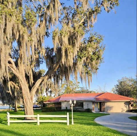 Photo of 630 Lake Blue Drive, Lake Placid, FL 33852 (MLS # O6377776)