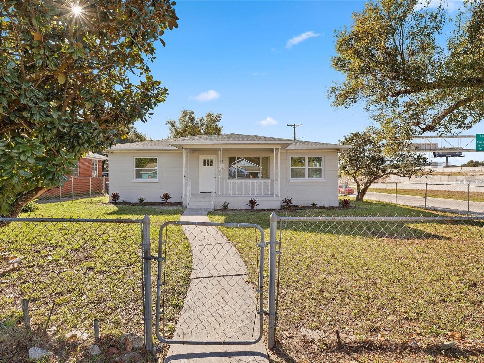 Don’t miss out on this beautifully renovated gem in the heart of Ybor Heights! This stunning 3-bedroom, 1-bath home blends modern upgrades with timeless charm. Step into a bright, open layout featuring luxury vinyl plank flooring throughout and a spacious front porch perfect for your morning coffee or evening relaxation.
The renovated kitchen boasts brand-new stainless steel appliances, granite countertops, and shaker-style cabinetry, ideal for both everyday living and entertaining. Enjoy peace of mind with a brand-new AC unit, no flood insurance required, no HOA, and no CDD—a rare find!
Located just minutes from Downtown Tampa, you’ll have easy access to top attractions including the Tampa Riverwalk, Florida Aquarium, Curtis Hixon Waterfront Park, and Glazer Children's Museum. Take in a show at the Tampa Theatre, Straz Center, or Amalie Arena, or immerse yourself in local history at the Tampa Bay History Center and Henry B. Plant Museum
Whether you're a first-time buyer, investor, or simply looking for a move-in-ready home near it all, this one is a must-see!