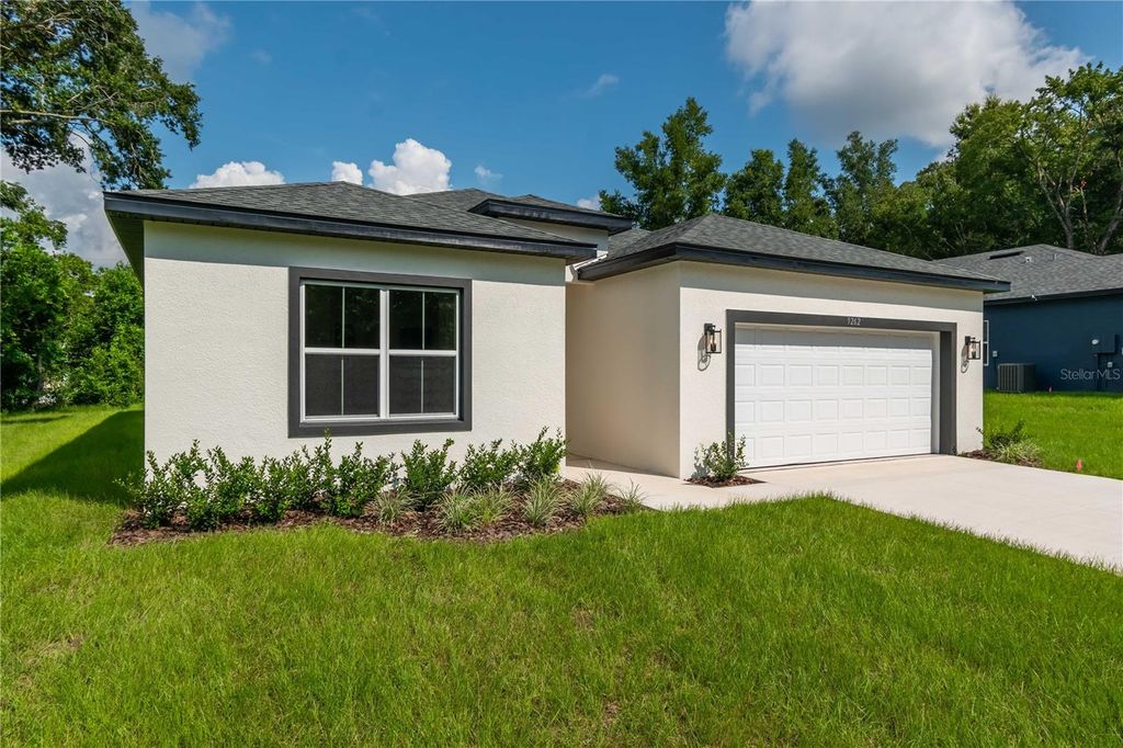 Photo of 9262 N Alpinia Drive, Citrus Springs, FL 34434 (MLS # O6399960)