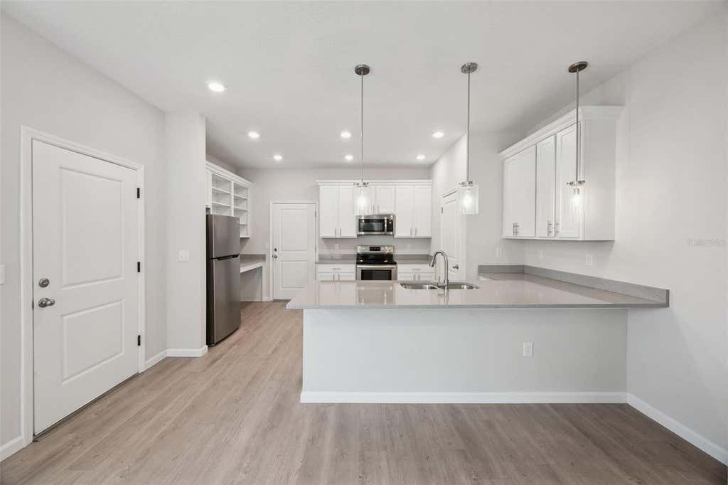 Photo of 2960 Oak Park Way #41, Orlando, FL 32822 (MLS # O6422634)