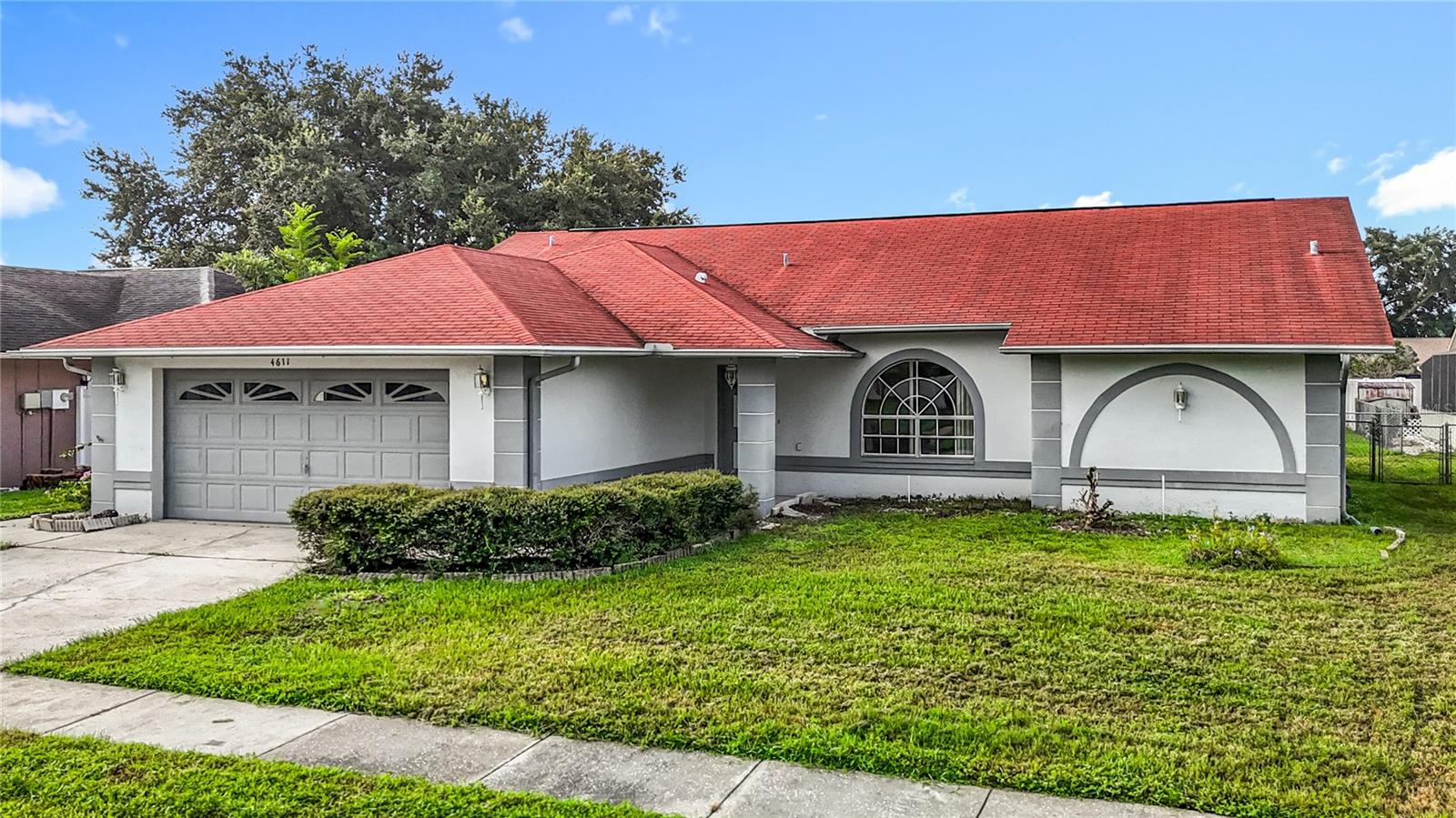 Welcome to this beautifully maintained home that blends style, function, and everyday comfort. With great curb appeal and a thoughtfully designed layout, this property is move-in ready and waiting for its next chapter.
Upon entering the living and dining room combination creates a welcoming space for gatherings, while the eat-in kitchen offers a cozy breakfast nook, built-in desk, and French doors that lead to the patio.Head down the hall to the spacious primary suite which feels like a retreat, featuring a tray ceiling, private en suite bath, walk-in shower, and large walk in closet.
Important big-ticket updates have already been done for you—Newer Roof, Newer A/C, and fresh carpet in the bedrooms—giving peace of mind for years to come.
The smart split-bedroom plan provides two additional bedrooms, ideal for family, guests, or a dedicated home office. An inside laundry room with storage cabinets and a utility sink adds everyday convenience.
Step outside to enjoy the Florida lifestyle: a screened-in lanai overlooks the fully fenced backyard, perfect for pets, playtime, or entertaining. With plenty of room for a garden, firepit, or swing set, you can truly make this outdoor space your own.
Property also includes an attached two-car garage offering plenty of parking plus extra storage for all your needs.
This home combines practical upgrades with warm, inviting spaces in a location that makes daily living easy. Don’t wait—schedule your private showing today and see why this home could be your perfect fit!