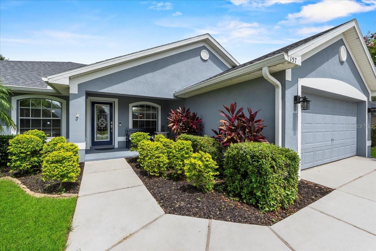 Under contract-accepting backup offers. Under contract-accepting back-up offers. Your Dream Pool Home Awaits at 157 Alexander Estates Dr! Tucked inside a gorgeous, established community just a short walk to scenic Lake Ariana, this beautifully updated 3-bedroom, 2-bath home offers the perfect balance of style, comfort, and convenience. Boasting over 2,035 sqft of thoughtfully designed living space, you'll love the flow of this home - from the formal dining room and private office/den to the light-filled main living area with vaulted ceilings, fresh interior and exterior paint, and new plank tile flooring. The renovated kitchen is both stunning and functional with gorgeous white granite countertops, under-cabinet lighting, custom pantry, and ample counter space-ideal for family meals or entertaining. There's also an adjacent eat-in area that completes the heart of the home. Retreat to your spacious primary suite, featuring dual customized closets, a luxuriously updated bath with dual vanities, an expansive walk-in shower, and a custom-built linen closet. Enjoy a split bedroom plan with the other nicely sized two guest rooms and updated bathroom. Step outside to your private paradise: a heated saltwater pool (2018) with new LED lighting (2024), large screened enclosure surrounded by lush landscaping and brand-new St. Augustine sod. This .25-acre lot is as functional as it is beautiful, with a separate well for irrigation (2024), and fresh landscaping for worry-free outdoor living. Additional upgrades include: Roof (2021), A/C (2020), and wired for generator hook up. Partial vinyl fencing in the back (2018)