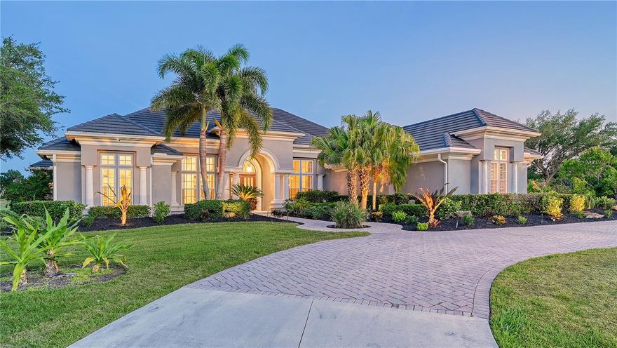 ***PRICE IMPROVEMENT***Step into this exquisite custom-built home by Arthur Rutenberg, nestled in one of the most captivating settings within Laurel Oak Estates. Enter this stunning modified residence, situated in the enchanting surroundings of Laurel Oak Estates. Offering a rare opportunity to indulge in a meticulously designed home while reveling in lake views and the picturesque landscape of Hole 16 on the Player course, it assures a lifestyle of incomparable splendor. Positioned on a corner lot, the residence enjoys exceptional seclusion, embraced by verdant tropical foliage and boasting 370 feet of tranquil lake frontage.With its soaring 14-foot ceilings and an abundance of windows and glass doors, the home is bathed in natural light, seamlessly merging indoor and outdoor spaces. Every detail has been meticulously considered in the transformation of this home into a haven of designer perfection, featuring top-of-the-line finishes and fixtures throughout. Comprising of four bedrooms,  four full bathrooms, a den, kitchen, great room, living room, dining room, wet bar, buffet, and a lanai with pool, spa, and Summer Kitchen, each corner exudes elegance and refinement. The kitchen serves as a culinary sanctuary, showcasing a restructured island, a 5-burner Thermador gas range, double Thermador ovens, Subzero refrigerator, new Elite cabinetry, Waterworks hand-made porcelain tile backsplash, and hand-blown Italian pendant lights. Retreat to the Owner’s Suite, a spacious haven with European fashion custom his and hers closets and a spa-inspired bathroom featuring custom cabinetry, a large walk-in shower, and a freestanding tub.This home offers peace of mind with a 2018 tile roof under warranty, upgraded variable speed AC units, a 4-part water purification system, and a Rinnai tankless gas water heater. Nestled within the esteemed Laurel Oak community, residents enjoy meticulously maintained grounds, 24/7 guard-gated entry, and optional Laurel Oak Country Club memberships. With its impeccable design and unmatched amenities, this residence epitomizes the Laurel Oak lifestyle at its finest.