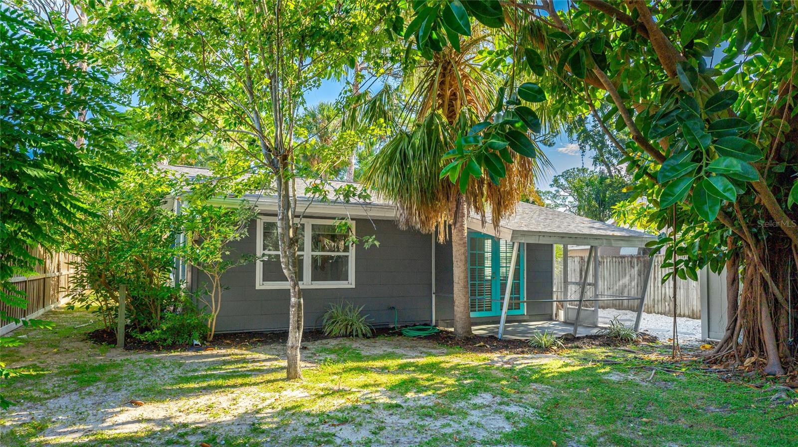 Welcome to your Sarasota Bungalow — a beautifully updated and move-in-ready 2-bed / 1-bath home that perfectly blends charm, comfort, and value. Tucked away in a quiet neighborhood just minutes from downtown Sarasota, University Parkway, and Lido Beach, this stunning retreat delivers the convenience of in-town living with the relaxed feel of a coastal lifestyle. Enjoy peace of mind with a NEW ROOF, NEW A/C, hurricane-impact windows, and full interior renovation.
Situated on a spacious, fully fenced, private homesite surrounded by mature trees, the property is ideal for pets, play, and outdoor entertaining. Inside, an open, light-filled floorplan features modern laminate flooring, quartz countertops, French doors, and a sleek kitchen with stainless-steel appliances and stylish finishes. Thoughtful upgrades throughout, including a tankless water heater, washer/dryer, and dedicated detached storage unit, ensure both beauty and functionality.
Whether you're a first-time buyer, downsizer, or investor — opportunities like this are rare at this price point. Be sure to experience the 3D-Matterport interactive virtual walkthrough tour. Experience the best of Sarasota living — schedule your private showing today!