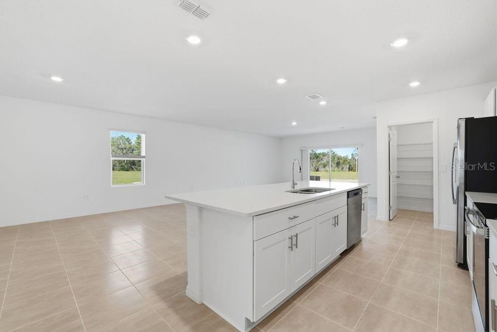 Photo of 13640 Tropical Breeze Way, Hudson, FL 34669 (MLS # TB8412293)