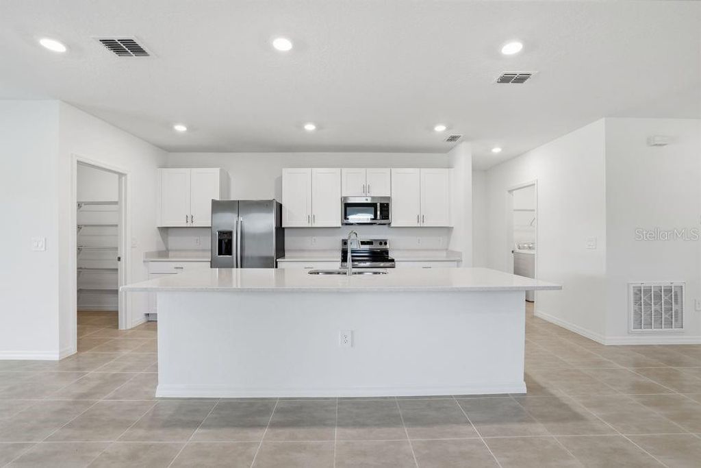 Photo of 13640 Tropical Breeze Way, Hudson, FL 34669 (MLS # TB8412293)