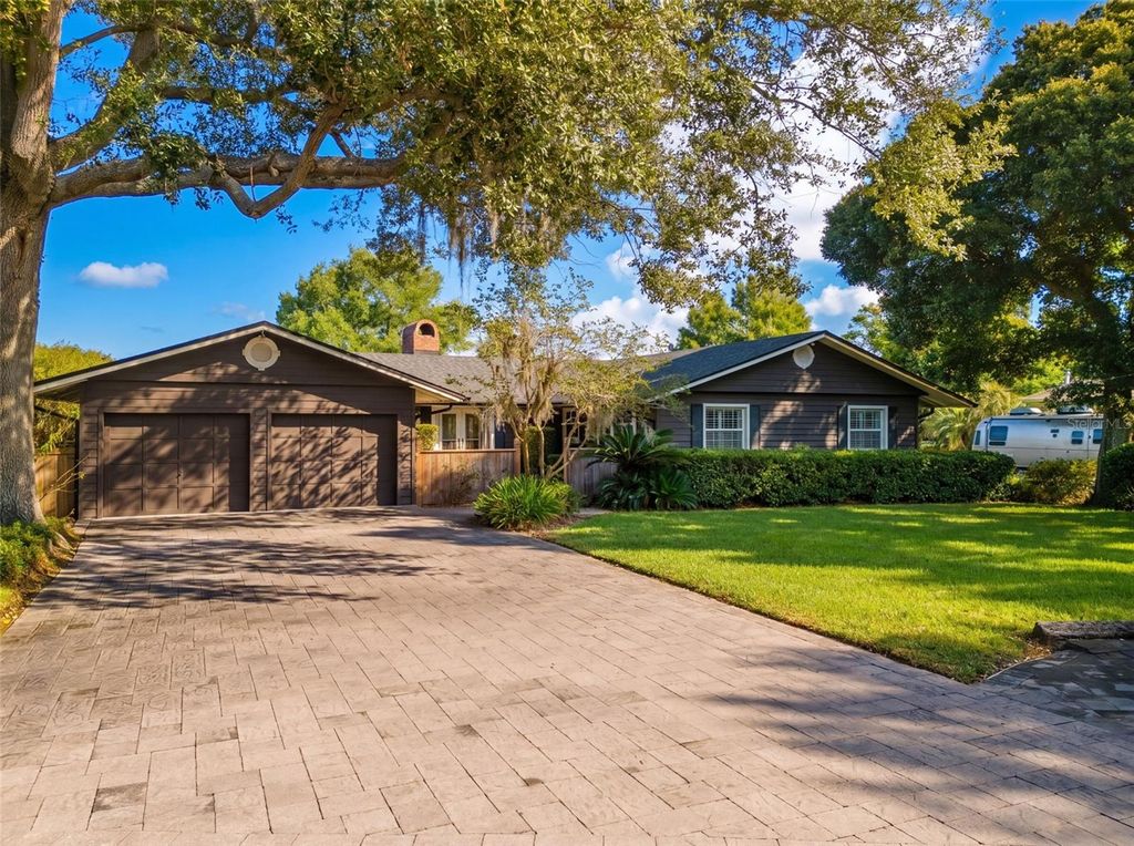 Photo of 517 Derry Down Road, Orlando, FL 32806 (MLS # O6407854)