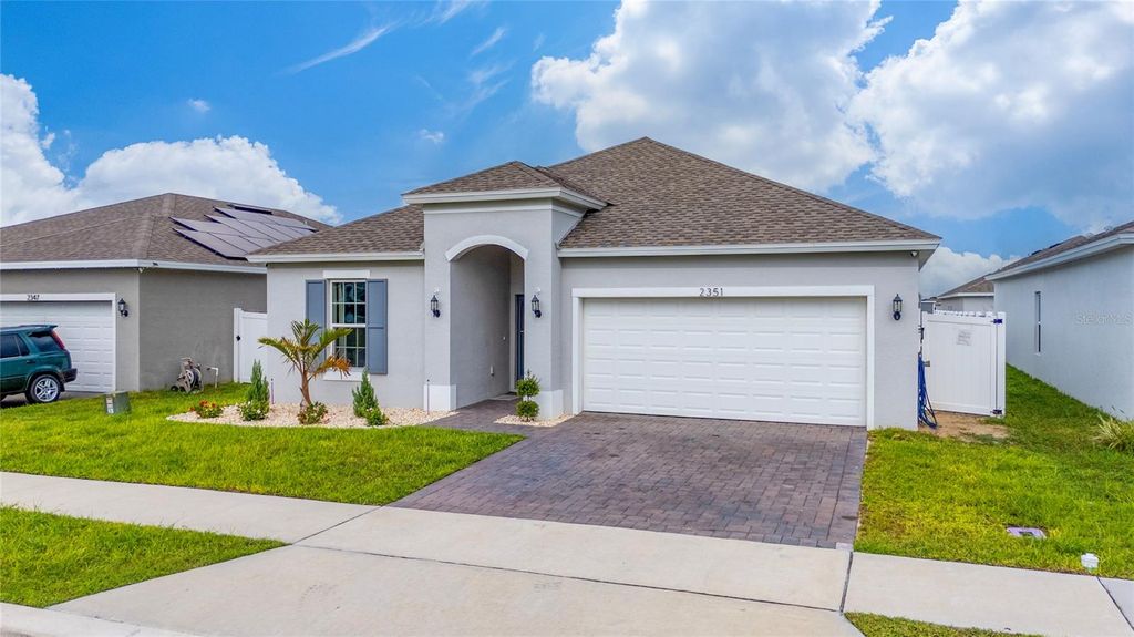 Photo of 2351 White Cedar Way, Haines City, FL 33844 (MLS # O6354775)