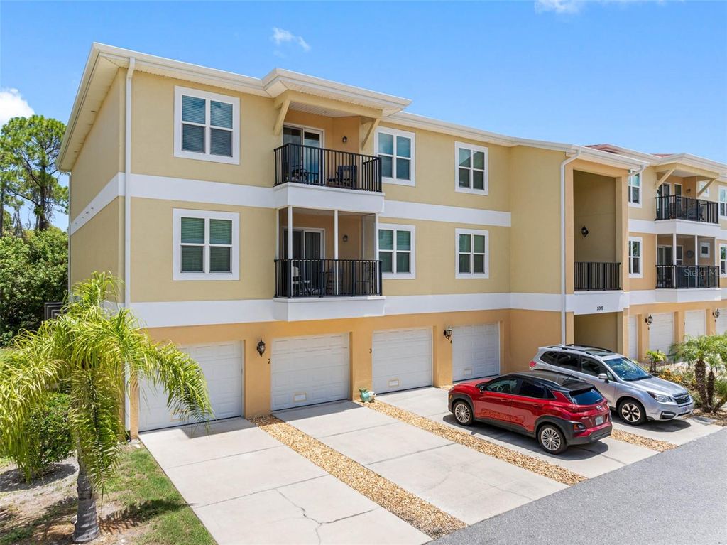 Photo of 5089 Royal Palms Way #202, New Port Richey, FL 34652 (MLS # TB8449889)