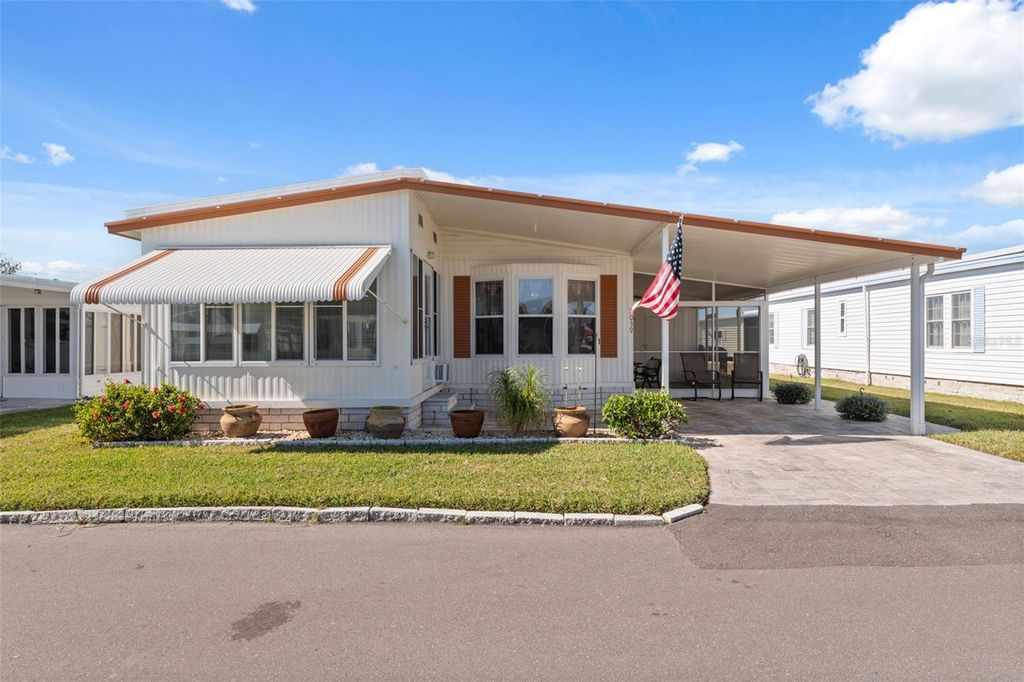 Photo of 2039 Kona Drive, Holiday, FL 34691 (MLS # W7880737)