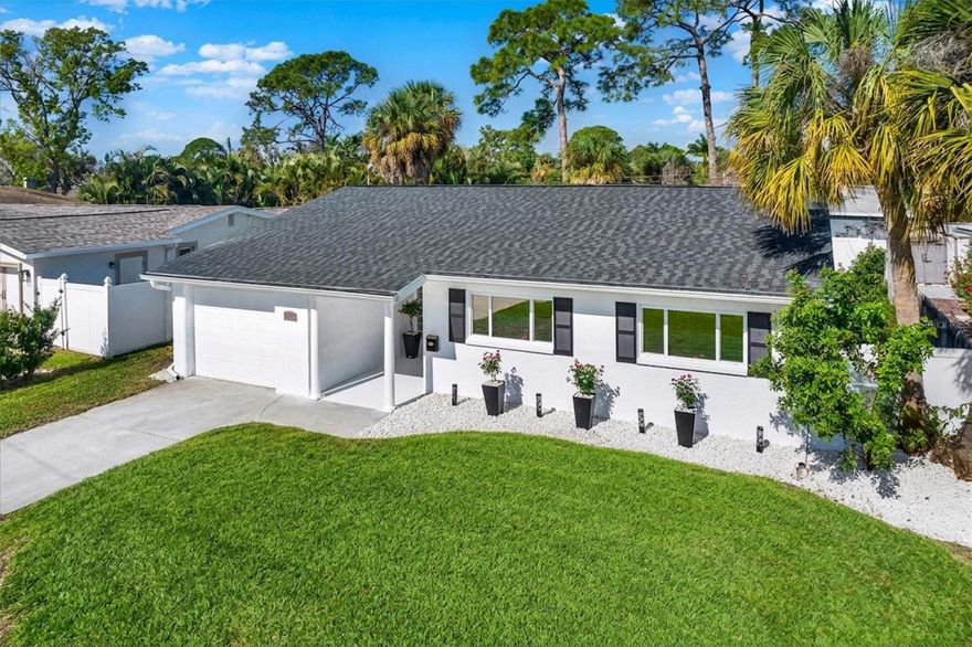 One or more photo(s) has been virtually staged. Welcome to this beautifully remodeled 3-bedroom, 2-bath, 1,606 sq ft home with a one-car garage located in the desirable Shore Acres neighborhood of St. Petersburg. This move-in ready property features a complete renovation with modern finishes throughout.

The home offers brand new flooring and fully remodeled bathrooms designed with style and comfort in mind. The brand-new kitchen showcases modern cabinetry, stylish finishes, and new appliances. It comes equipped with stainless steel refrigerator, dishwasher, microwave, and range/oven, making it ready for everyday living from day one. A new water heater has also been installed, and the washer and dryer are conveniently located in the garage.

The home has been updated with a brand-new roof, providing added peace of mind. Both bathrooms have been completely renovated with contemporary fixtures and refined finishes.

Located in the desirable Shore Acres neighborhood, known for its quiet streets, strong community atmosphere, nearby parks, and convenient access to downtown St. Petersburg, shopping, dining, and major highways.

Don’t miss the opportunity to own this beautifully updated home in a fantastic location.