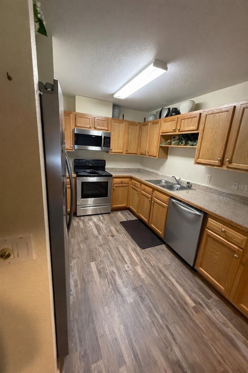 Photo of 913 Tropical Circle NW, Port Charlotte, FL 33948 (MLS # TB8498197)