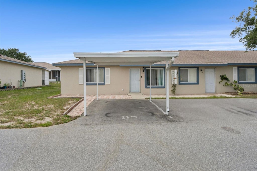 Photo of 115 Winter Ridge Drive #115, Winter Haven, FL 33881 (MLS # P4939017)