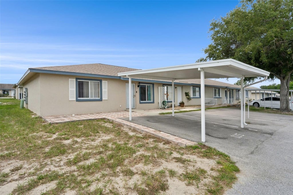 Photo of 115 Winter Ridge Drive #115, Winter Haven, FL 33881 (MLS # P4939017)