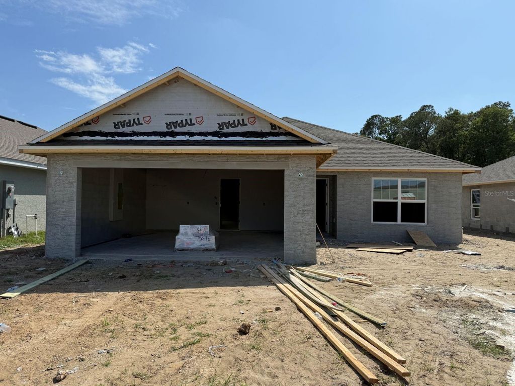 Photo of 2186 NW 23rd Loop, Ocala, FL 34475 (MLS # OM723079)