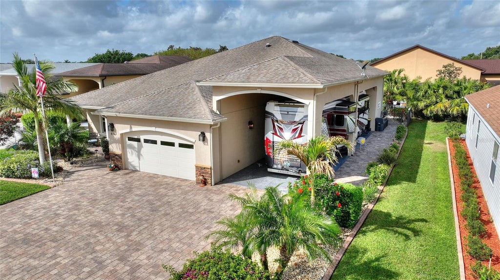 Photo of 416 Motorcoach Drive S, Polk City, FL 33868 (MLS # L4964677)
