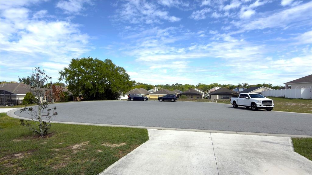 Photo of 345 Regency Ridge Drive, Davenport, FL 33837 (MLS # O6392871)