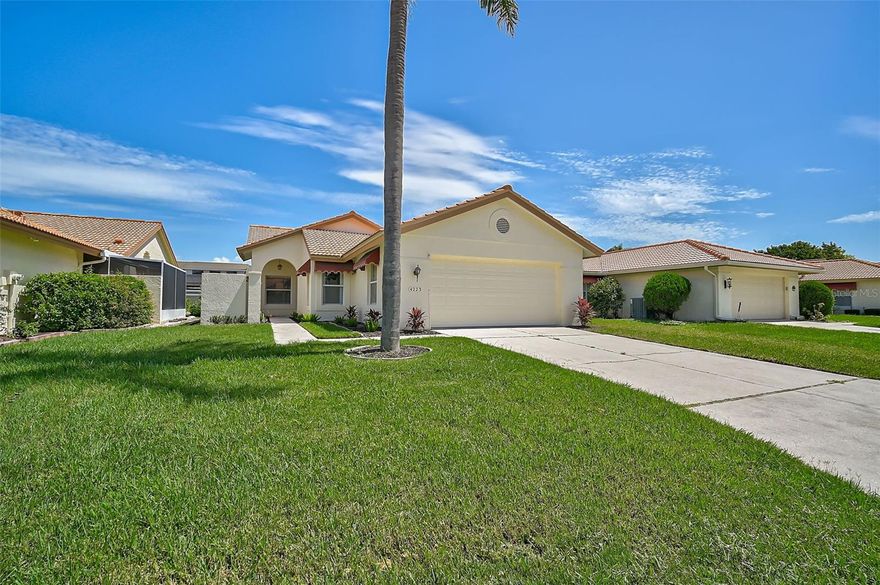 ALL NEW APPLIANCES and Sellers offering $5,000 Credit at Closing towards carpeting! Sellers are MOTIVATED and all reasonable offers are encouraged. Freshly painted interior, including the garage and garage floor! This well-maintained Rutenberg patio home features 2 bedrooms, 2 bathrooms, and a versatile den—perfect for a home office or additional living area. The primary suite offers an oversized closet and a spacious bathroom with both a shower and a separate soaking tub. The kitchen includes a functional island and an eat-in area suitable for casual dining. Enjoy the added living space of a screened porch, ideal for relaxing or entertaining guests. Recent improvements include new sod and exterior paint completed in 2024, boosting curb appeal. A roof replacement in 2020 adds long-term value and peace of mind. Don’t miss this opportunity to personalize and transform this home into your Florida retreat! Located in the vibrant Peridia Golf & Country Club community, you'll have access to an 18-hole executive golf course, perfect for golf enthusiasts of all levels. Participate in a wide range of activities to keep you engaged and entertained. Enjoy tennis, pickleball, Mahjong, join the bowling league, or participate in members-only events. On Friday nights, unwind with live music at the country club. Whether you prefer an active lifestyle or a more relaxed pace, Peridia has something for everyone. $100 Application Fee; $337 Quarterly Yard Care; $450 Annual food/beverage Minimum; $877 Quarterly Master Association; $4,000 One Time Capital Reserve.