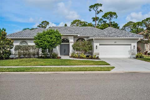 Photo of 629 Sawgrass Bridge Road, Venice, FL 34292 (MLS # A4696682)