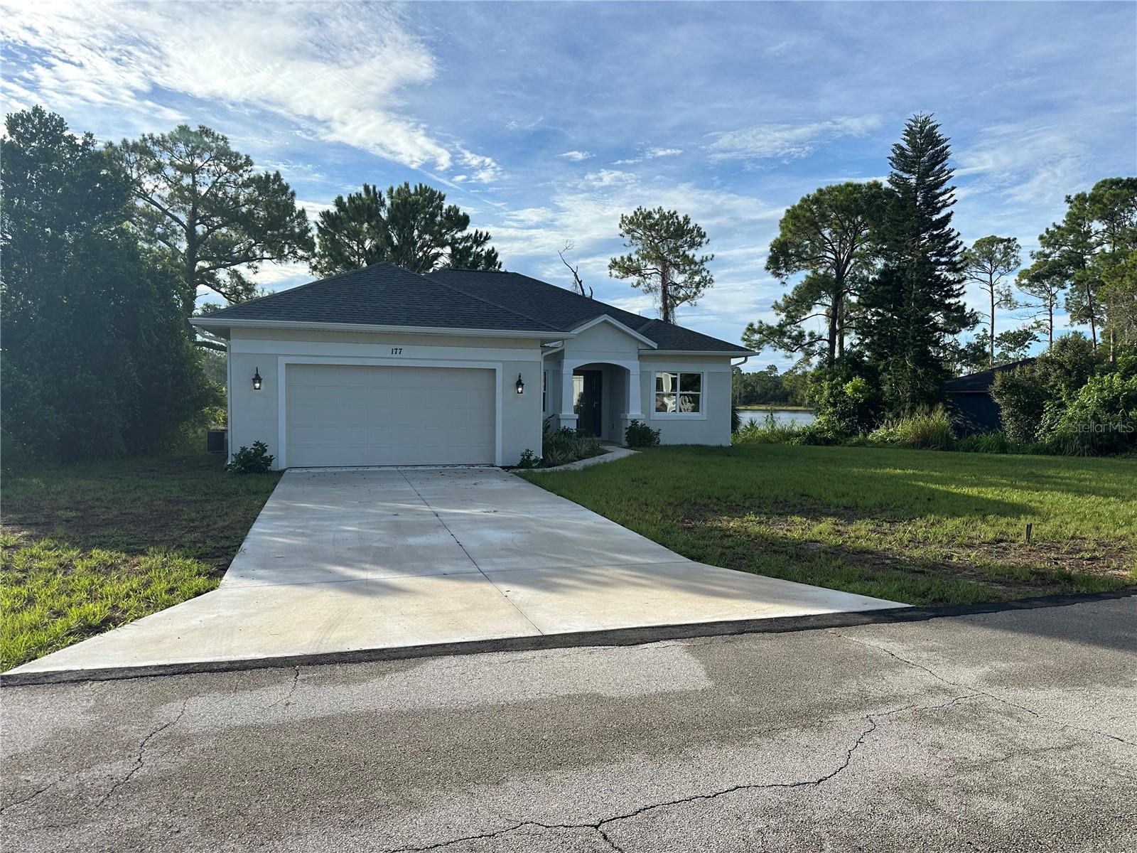 **Discover Your Dream Waterfront Oasis in Deltona, FL!**
Welcome to your slice of paradise! This stunning new construction home beautifully combines modern elegance with the serene tranquility of waterfront living on the Lake Butler Chain. Nestled in the heart of Deltona, this 3-bedroom, 2-bath gem with a den is perfect for families, retirees, or anyone looking to embrace a lifestyle full of comfort and leisure.
As you step inside, you’ll be greeted by an abundance of natural light that fills the spacious open-concept living area. The contemporary kitchen boasts sleek Quartz countertops, stainless steel appliances, and a large island, ideal for entertaining guests or enjoying casual family meals. The adjoining dining space offers picturesque views through expansive windows that frame the scenic waterfront backdrop.
The primary suite is a true sanctuary featuring generous closet space and an en-suite bath equipped with dual vanities, a luxurious walk-in shower and free standing soaking tub. Two additional well-appointed bedrooms provide ample room for family or guests, ensuring everyone has their own haven to retreat to at the end of each day. Step outside onto your private patio and savor morning coffee while watching the sun rise over the water.
Conveniently located near I-4, shopping, dining, and parks.
Schedule your private tour today!