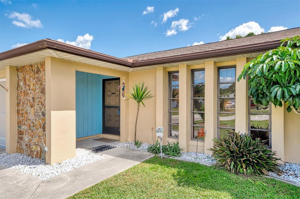 Photo of 917 Tropical Avenue NW, Port Charlotte, FL 33948 (MLS # C7515650)