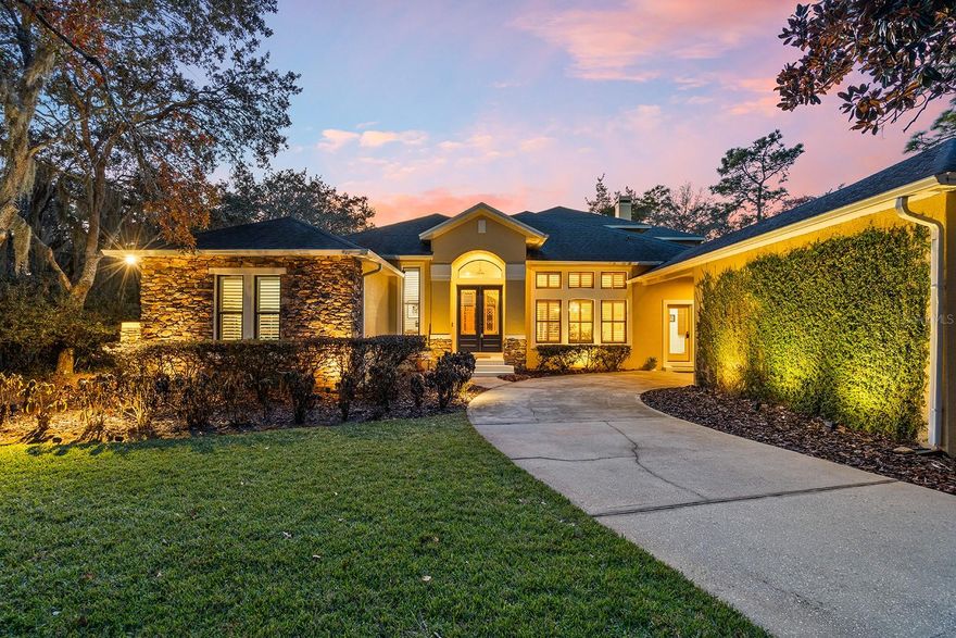 SPECTACULAR 4 bedroom 3 1/2 bath home with an office, flex room and upstairs bonus room is ready for its new owners!! With deeded access to SKIABLE, LAKE PICKETT.  As you pull into the CIRCULAR DRIVEWAY with the two car garage, the grand entrance of this home will have you WOWED   With a formal dining room and wine bar, separate living room and office with built-in book shelves, this is only the beginning of what this home has to offer.  The primary bedroom is DOWNSTAIRS with adjoining bathroom.  The WHIRLPOOL tub is ready for relaxing baths.  His and her vanities and large wrap-around closet.  The kitchen is a CHEF'S DREAM!  It boosts CUSTOM CABINETRY, thermador INDUCTION cooktop with a built in retractable vent. NEW dishwasher, also newer appliances. GRANITE countertops, coffee station and reverse osmosis system.Enjoy your morning coffee overlooking the SCREENED, SALTWATER POOL with a spa from the breakfast nook.  Washer and dryer will stay along with an additional refrigerator in the INSIDE laundry room. Additionally, a full bedroom and bath is also DOWNSTAIRS.  The COZY family room has large windows with natural lighting and a two sided WOOD burning fireplace. Just on the other side of the fireplace is the most beautiful flex space.  Picture yourself reading a book or sipping wine overlooking the backyard with NO REAR NEIGHBORS.  The spiral staircase leads you upstairs to two bedrooms and a full bath.  The flex space or bonus room can be used as you desire. There is a balcony off the bonus room and rear bedroom for sitting or bird watching. With an ACRE of property, this home feels peaceful, private and yet within 10 minutes to the grocery store.  Seminole County Schools, 45 minutes to the beach and Kennedy Space Center.  UCF and Seminole State college are just a short 20 minute drive.  Schedule your tour of this FABULOUS home today!!