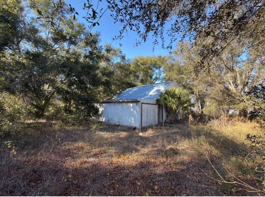 The nicest 10.45-acre parcel available, with an enclosed concrete floor barn. Location, high elevation, electric, well, and fenced. The owner had planned to build a 4,000-square-foot home with a pad on-site, but had to let the dream go. NOW, the dream can be yours. High and dry, size 330x1366x330x1366, fenced in as well. Sellers are anxiously awaiting an offer. Great ground, good pasture for horses and cows. Short distance to shopping and I-75. Nice homes on both sides. Small pond in the back. Easy to see, just make an appointment to see and make an offer!