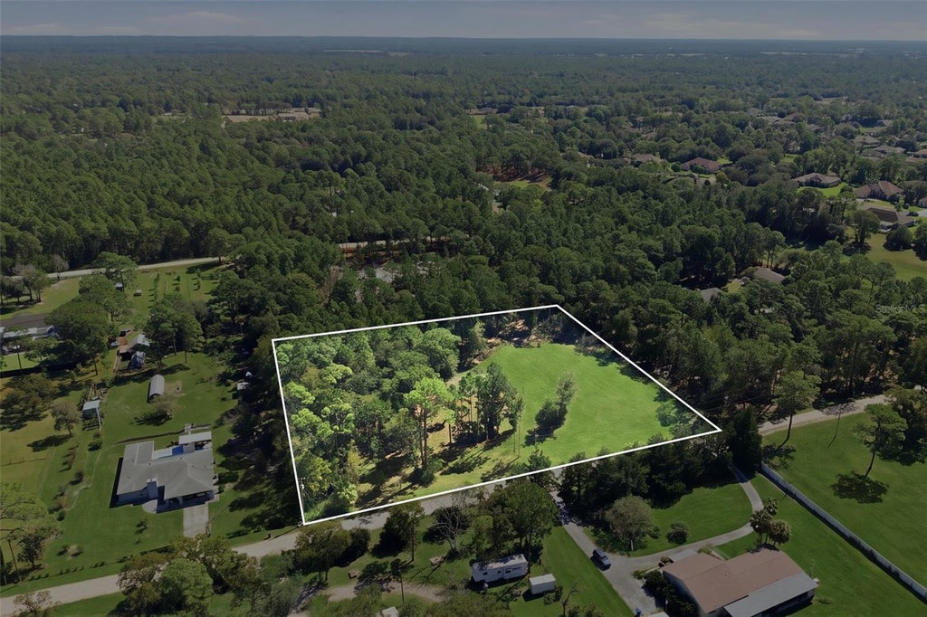 Photo of 14356 Highgrove Road, Spring Hill, FL 34609 (MLS # W7890246)