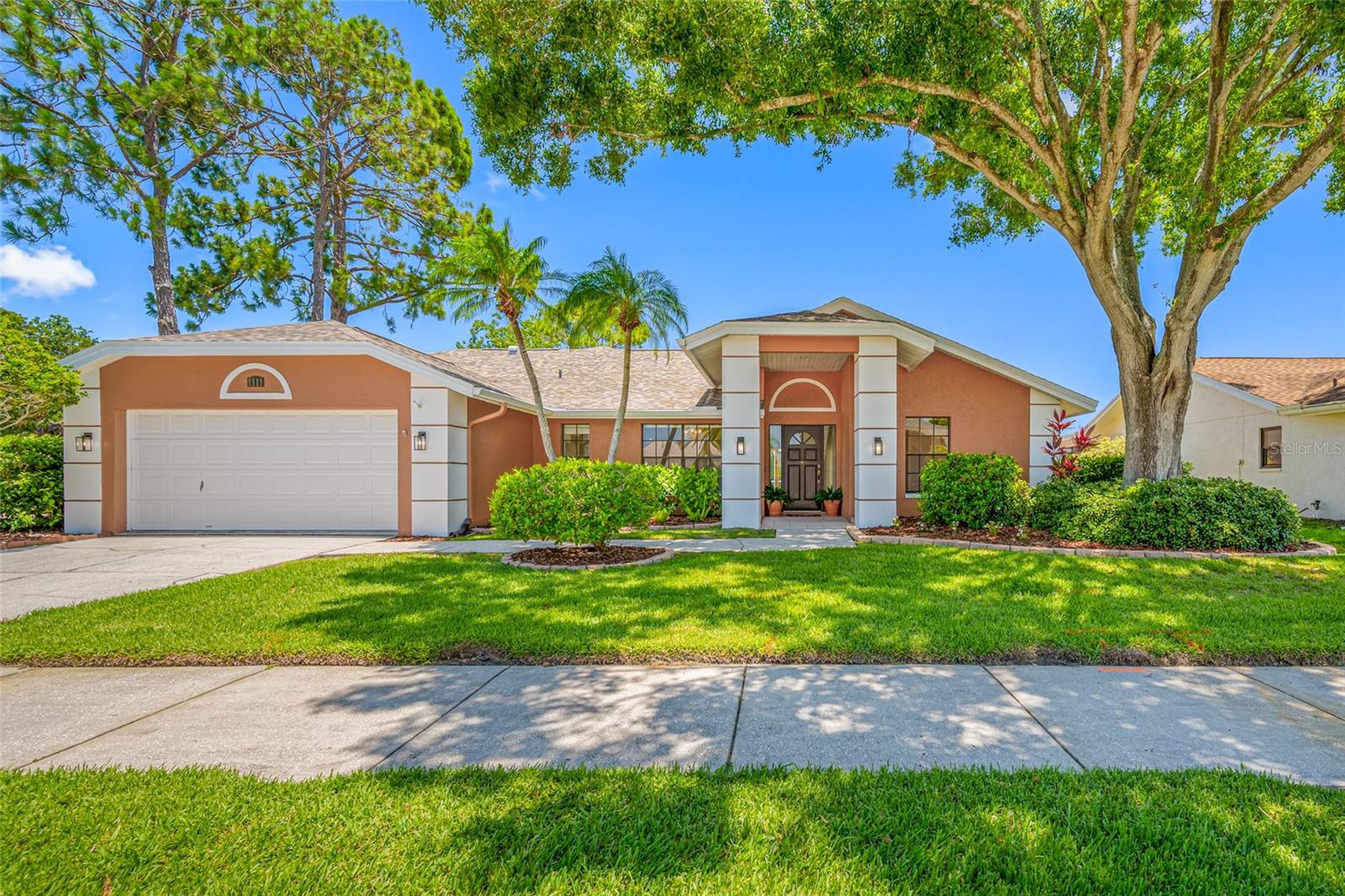 One or more photo(s) has been virtually staged. *** YOU HAVE SCORED A TOUCHDOWN HERE,....because This HOME is PRICED TO SELL!*** MUST SEE TO APPRECIATE!!! After a picturesque drive into Huntington Trails Community entrance, you arrive at 1111 Chatham Court—a solid block-built home, resting on a lush, wide corner lot. Mature Florida landscaping and flowering hedges frame the attractive exterior, setting the tone for the pride of ownership that defines this highly desirable neighborhood.
**Located in an X Flood Zone, this property currently does not require flood insurance—offering both security and cost efficiency for homeowners.**
Step inside and feel instantly at home. This spacious, sun-drenched layout offers both elegance and comfort, beginning with a formal dining room perfect for hosting. Two generous living areas provide flexibility for entertaining or relaxing—one featuring a cozy wood-burning fireplace that anchors the space with warmth and charm.
The heart of the home is a chef-inspired kitchen with stainless steel appliances, granite countertops, subway tile backsplash, and an abundance of soft-close cabinetry and pull out drawers. A breakfast bar and eat-in nook make mornings easy and inviting.
The split-plan design offers four sunlit bedrooms, including a luxurious primary suite with soaring vaulted ceilings, an oversized walk-in closet, and a private en-suite bath. Thoughtfully updated with sleek, modern finishes, the bathroom provides a spa-like retreat that invites you to unwind in style.
Enjoy the convenience of a spacious, fully equipped laundry and utility room—featuring a full-size washer and dryer and generous cabinetry for storage and easy organization.
In the 2 car garage, take advantage of a generously sized, partially finished attic space—complete with built-in shelving and overhead lighting—ideal for organized storage, seasonal décor, or even a future hobby nook.
Enjoy seamless access to the beautiful, screened-in sparkling swimming pool and expansive covered lanai from nearly every room in the home. Whether you're hosting a weekend gathering or enjoying a quiet morning coffee, this private and inviting outdoor haven not only extends your living space but truly embodies the essence of Florida living.
Rest easy knowing the home’s major upgrades have all been taken care of within the last five years. Noteworthy improvements include fresh exterior paint in 2023 and a full interior refresh in 2025—complete with the removal of all popcorn ceilings. The kitchen is equipped with newer appliances and enhanced by modern lighting fixtures, while the water heater and HVAC system were both replaced in 2024. To top it all off, the roof was updated in 2019, ensuring peace of mind for years to come.
1111 Chatham Court blends comfort, style, and functionality. The Huntington Trails neighborhood in Safety Harbor offers the best of both worlds: proximity to the vibrant downtown, scenic waterfront parks, and miles of bike and walking trails—plus access to top-rated schools.
Golf cart-friendly! Experience the peace and pride of belonging to a community that genuinely feels like home.