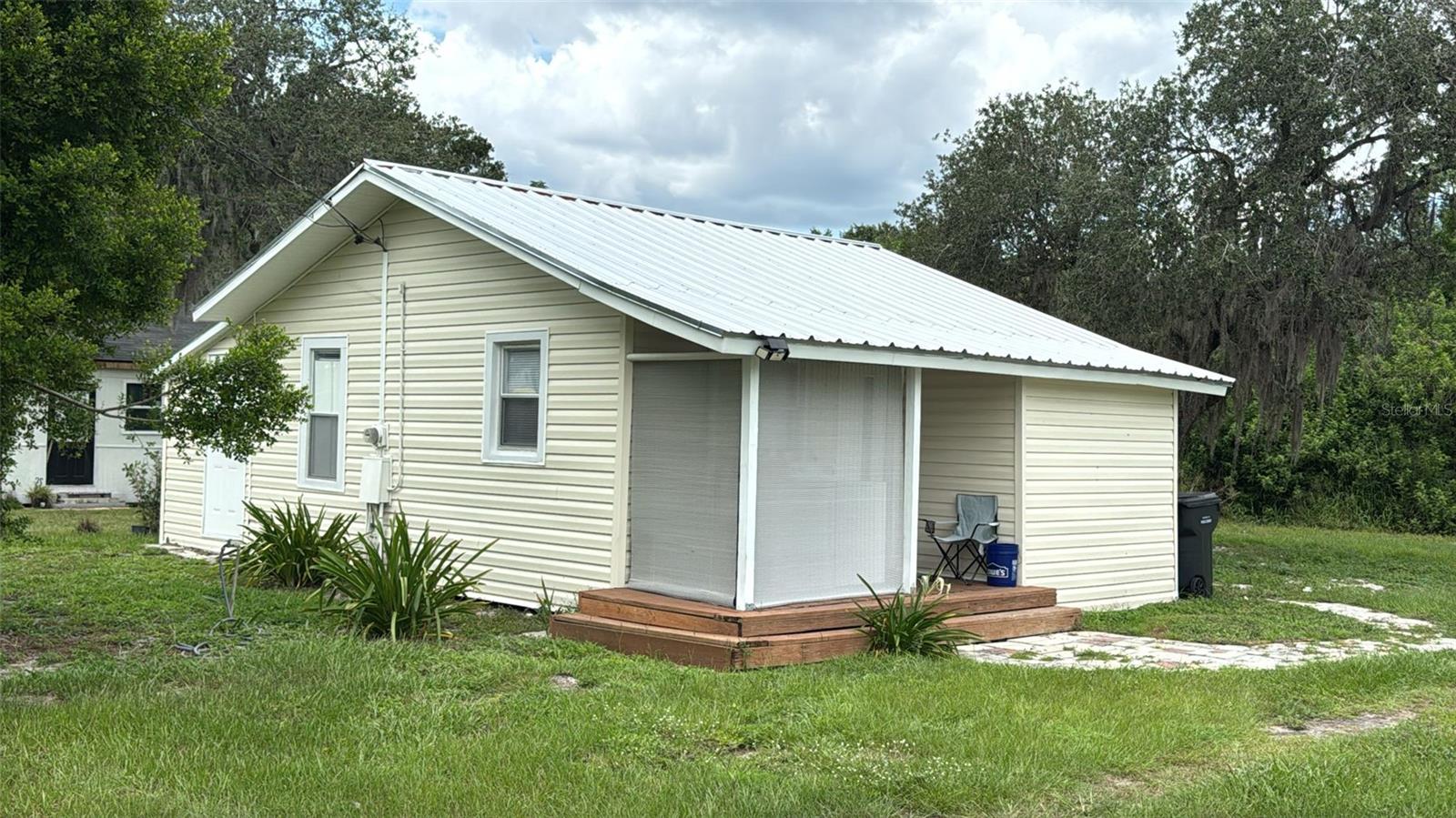 INVESTOR SPECIAL! Potential $6,000.00+/month revenue investment opportunity. All located in 2 side-by-side parcels. NO HOA! Unlock incredible potential with this rare double-lot opportunity in an excellent investment type area of Auburndale! This unique property package includes one lot with three single-family homes (1/1, 2/1, and 3/1) 2 of which are fully renovated with new AC, new roof, new septic system and tankless water heaters with third home, a 2/1, needing complete renovations (seller can finish renovations with price adjustment). Also included is the adjacent commercial lot featuring a fully renovated office and residential mixed use building (two 1/1 units in rear and office space in the front + two separate bathrooms). Each home and office has its own generous parking area. With its prime location just minutes from downtown Auburndale, scenic lakes, restaurants, and shopping, this property offers endless possibilities for investors, developers, or visionaries looking to capitalize on the area’s growth. Seller financing and private financing available. Don’t miss your chance, this one won’t last!