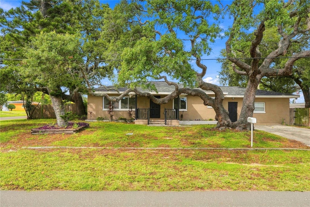 Photo of 10719 Cherokee Drive, St Petersburg, FL 33708 (MLS # TB8555089)